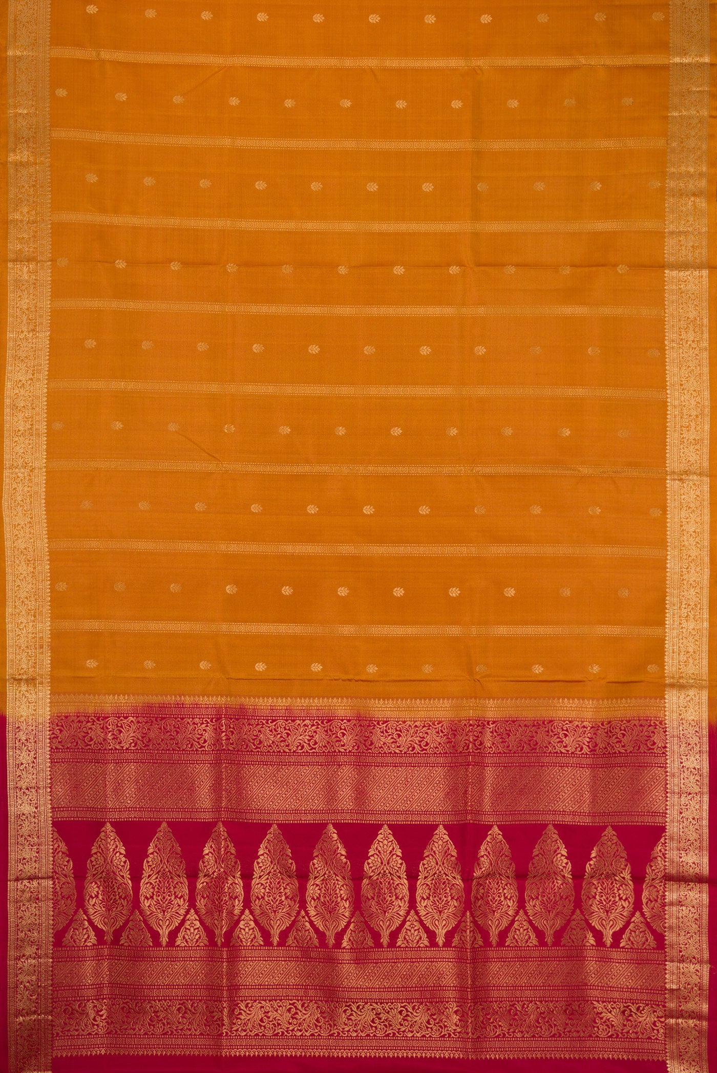 Flat view of Mustard Dual Tone Soft Silk Saree with Zari Butta on the body and Zari Border. 