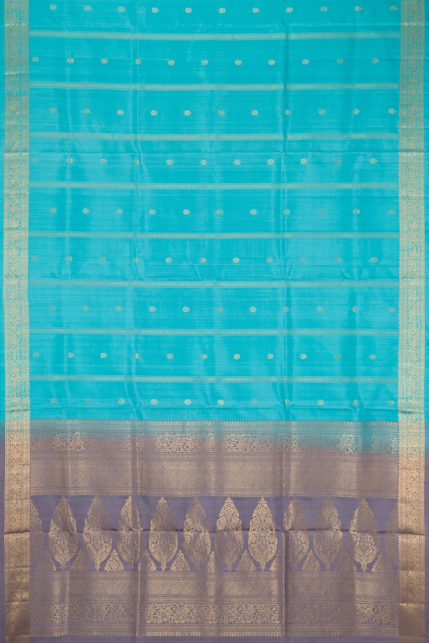 Flat view of Sky Blue Dual Tone Soft Silk Saree with Zari Butta on the body and Zari Border. 