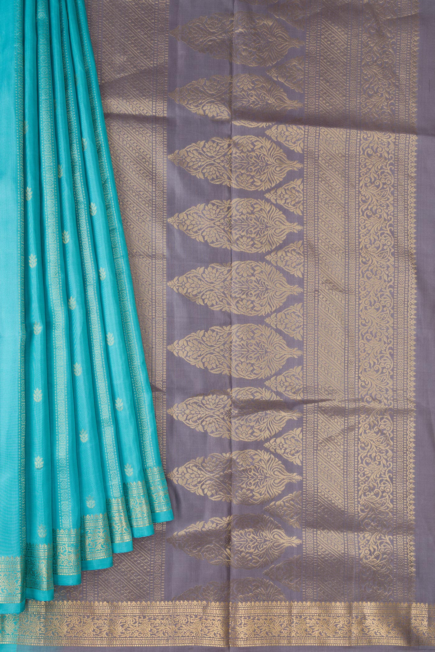 Pleats and pallu of Sky Blue Dual Tone Soft Silk Saree with Zari Butta on the body and Zari Border. 
