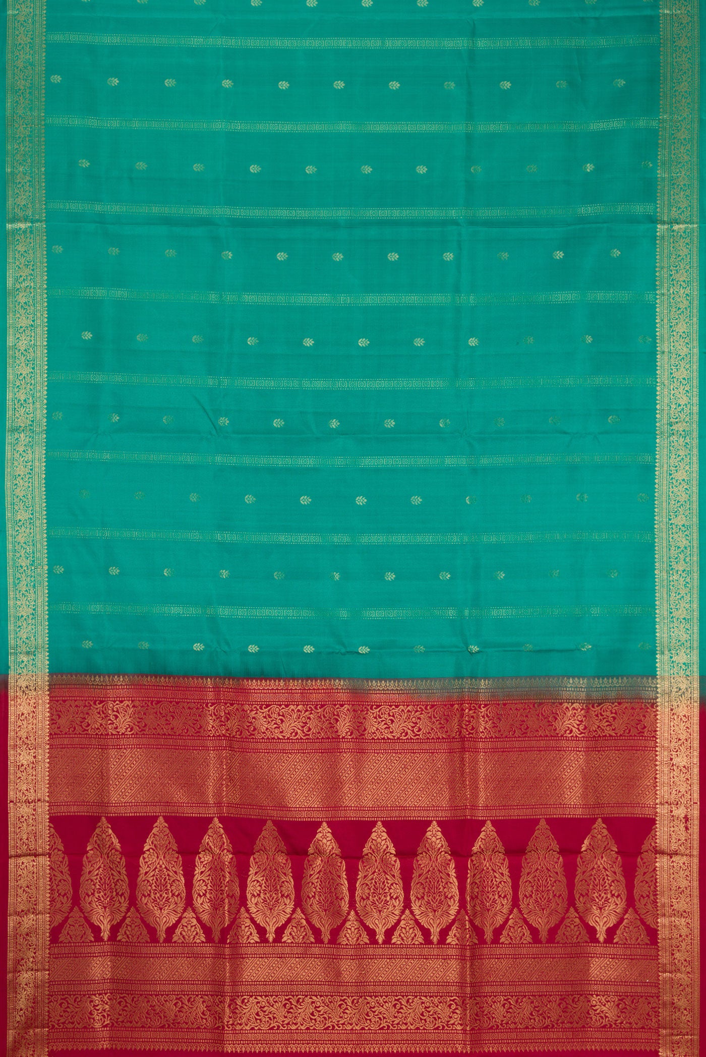 Flat view of Green Dual Tone Soft Silk Saree with Zari Butta on the body and Zari Border. 