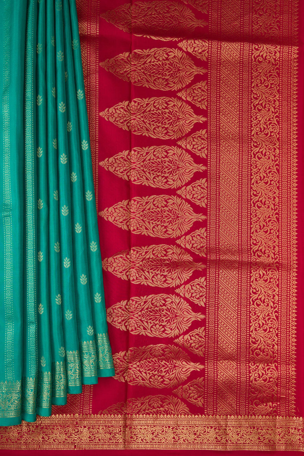 Pleats and pallu of Green Dual Tone Soft Silk Saree with Zari Butta on the body and Zari Border. 