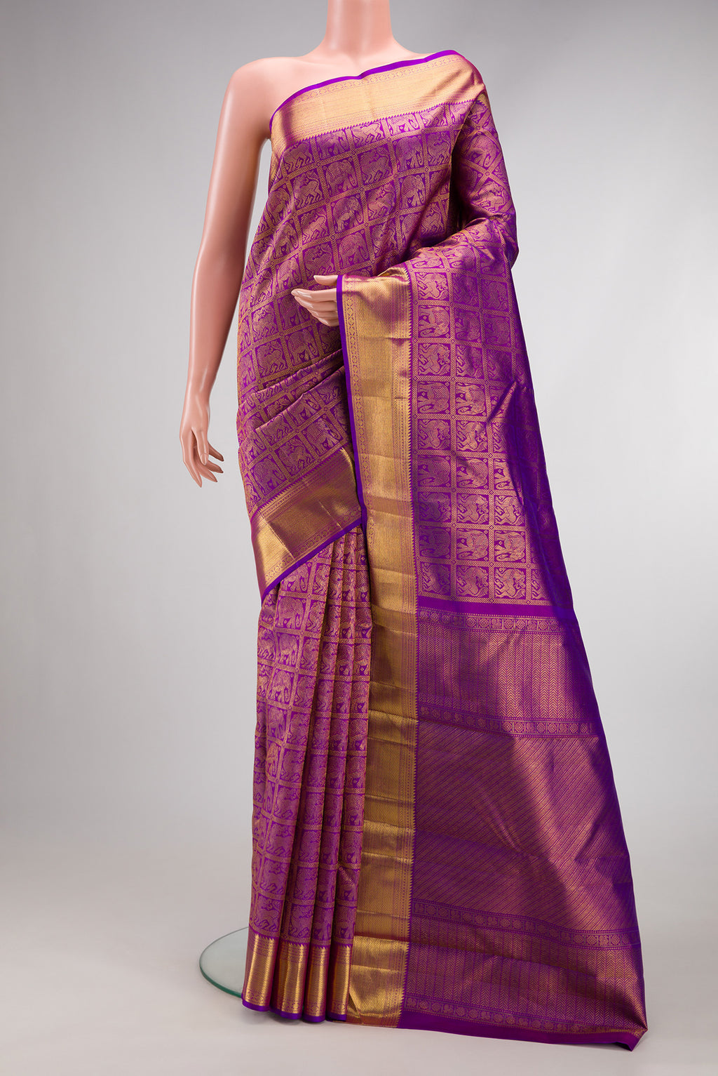 Violet Dual Tone Kanchipuram Silk Saree with Zari Brocade on the body and Zari Border.  displayed on a mannequin
