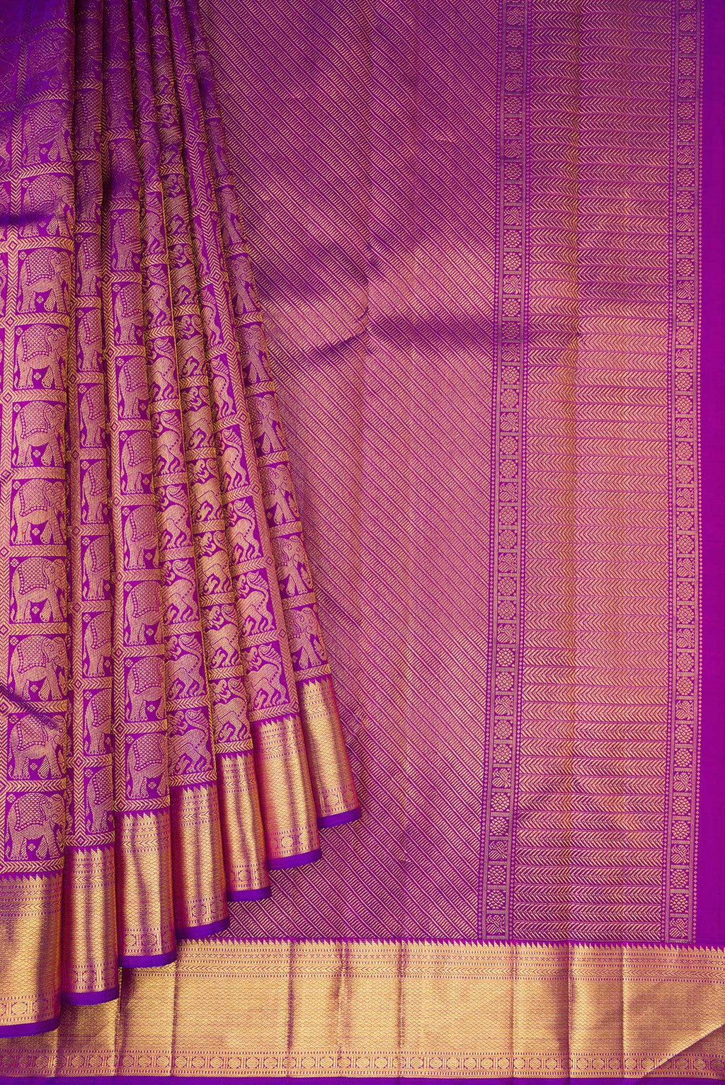 Pleats and pallu of Violet Dual Tone Kanchipuram Silk Saree with Zari Brocade on the body and Zari Border. 