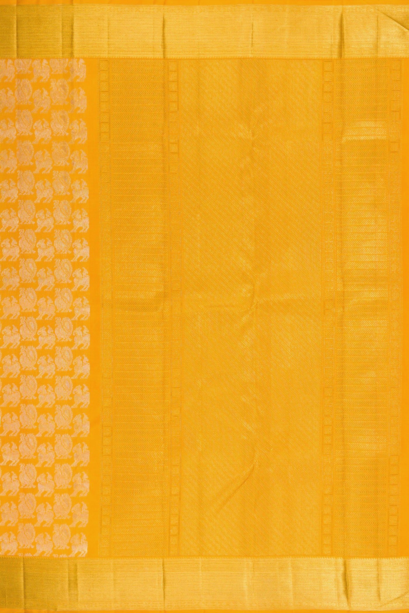 Close up image of the pallu of Mustard Kanchipuram Silk Saree with Zari Brocade on the body and Zari Border. 
