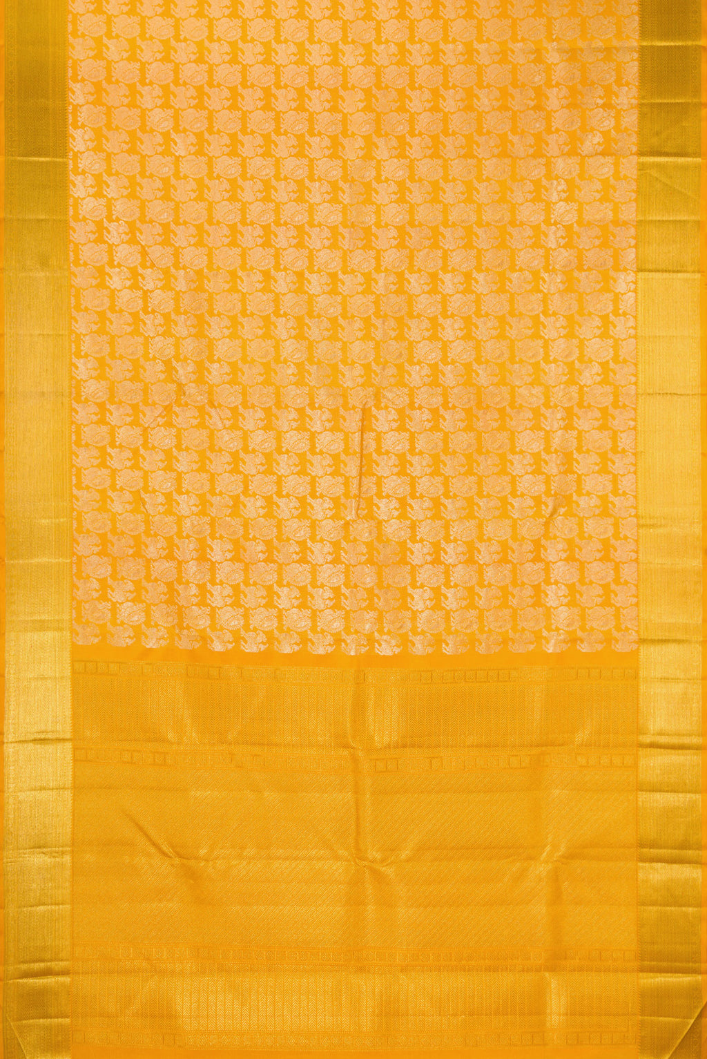 Flat view of Mustard Kanchipuram Silk Saree with Zari Brocade on the body and Zari Border. 