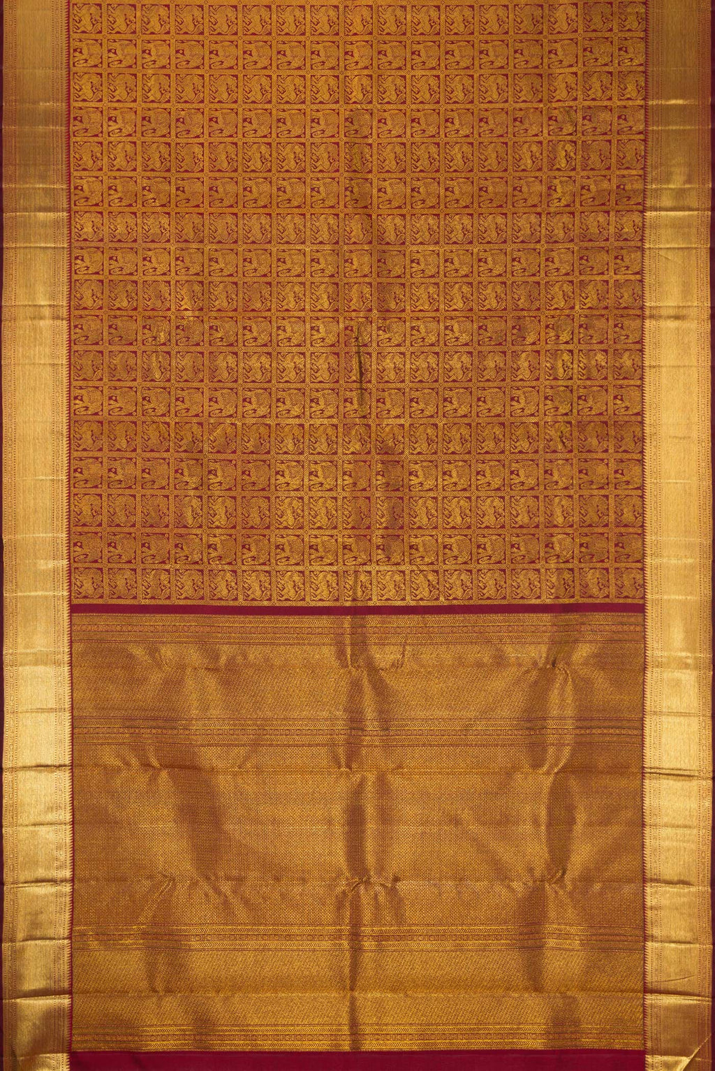 Flat view of Maroon Dual Tone Kanchipuram Silk Saree with Zari Brocade on the body and Zari Border. 