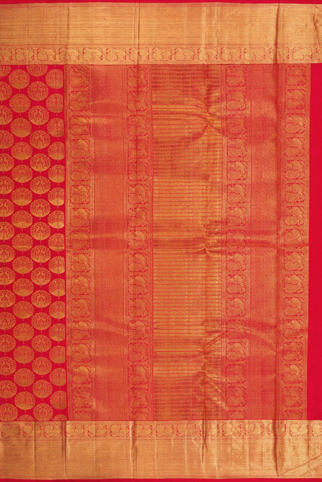Close up image of the pallu of Red Dual Tone Kanchipuram Silk Saree with Zari Brocade on the body and Zari Border. 
