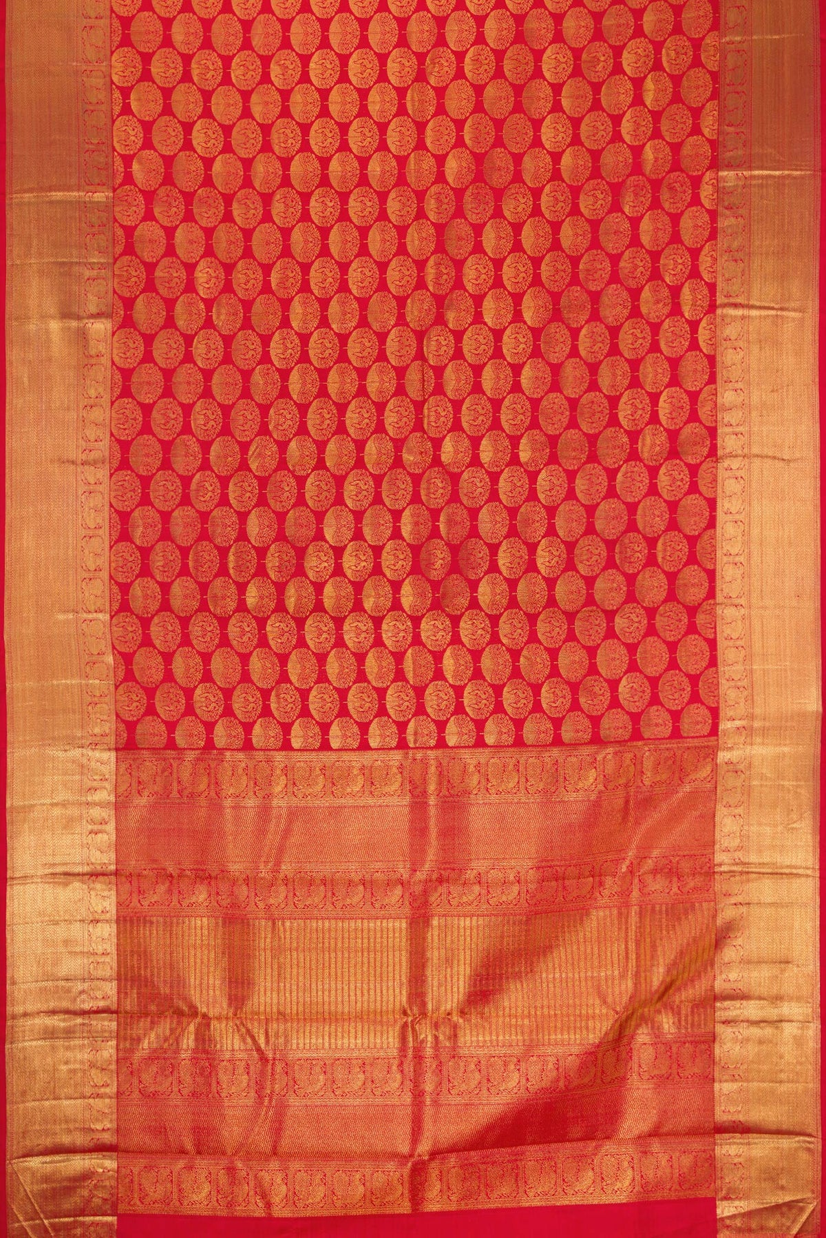 Flat view of Red Dual Tone Kanchipuram Silk Saree with Zari Brocade on the body and Zari Border. 