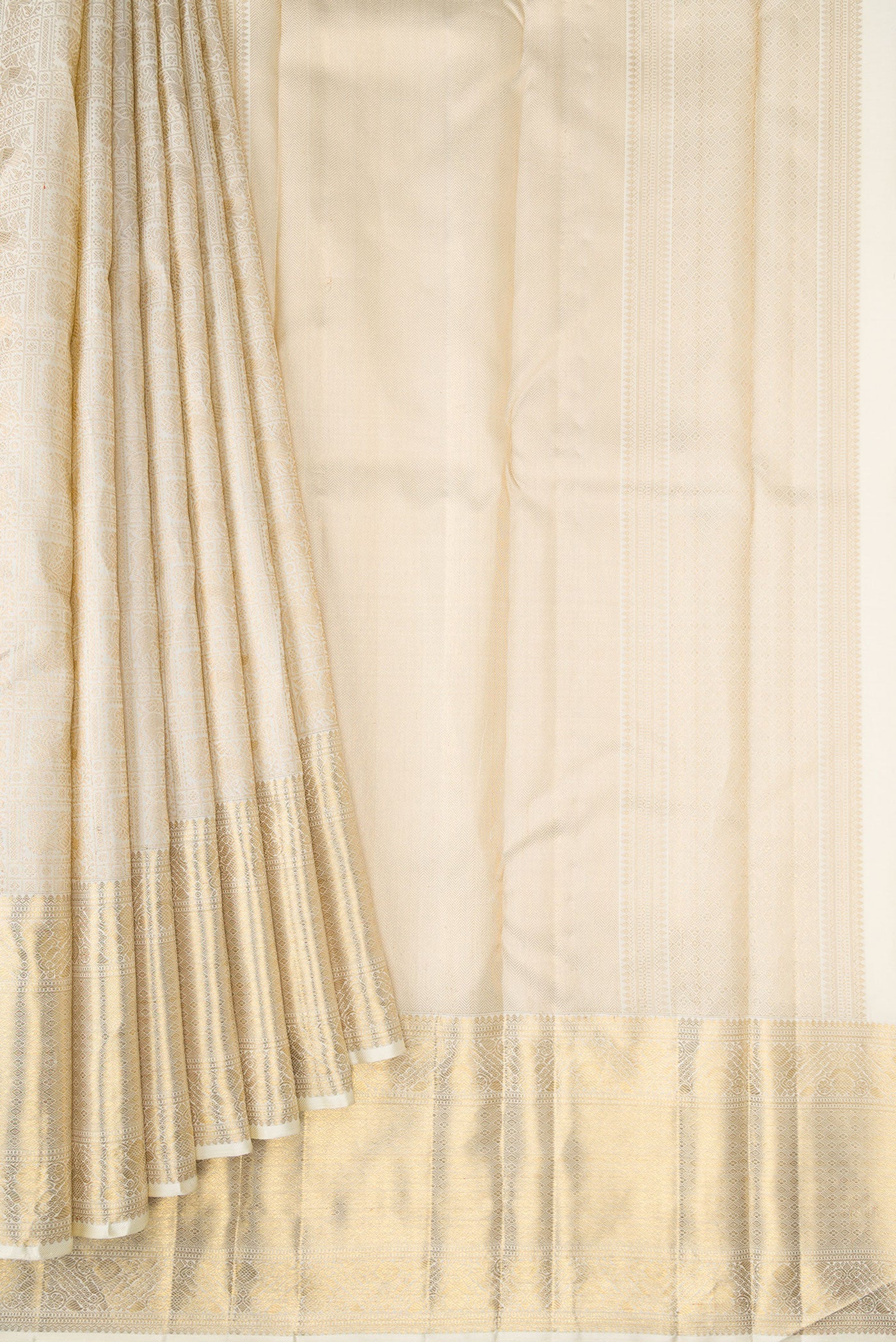Pleats and pallu of Off White Dual Tone Kanchipuram Silk Saree with Zari Brocade on the body and Zari Border. 