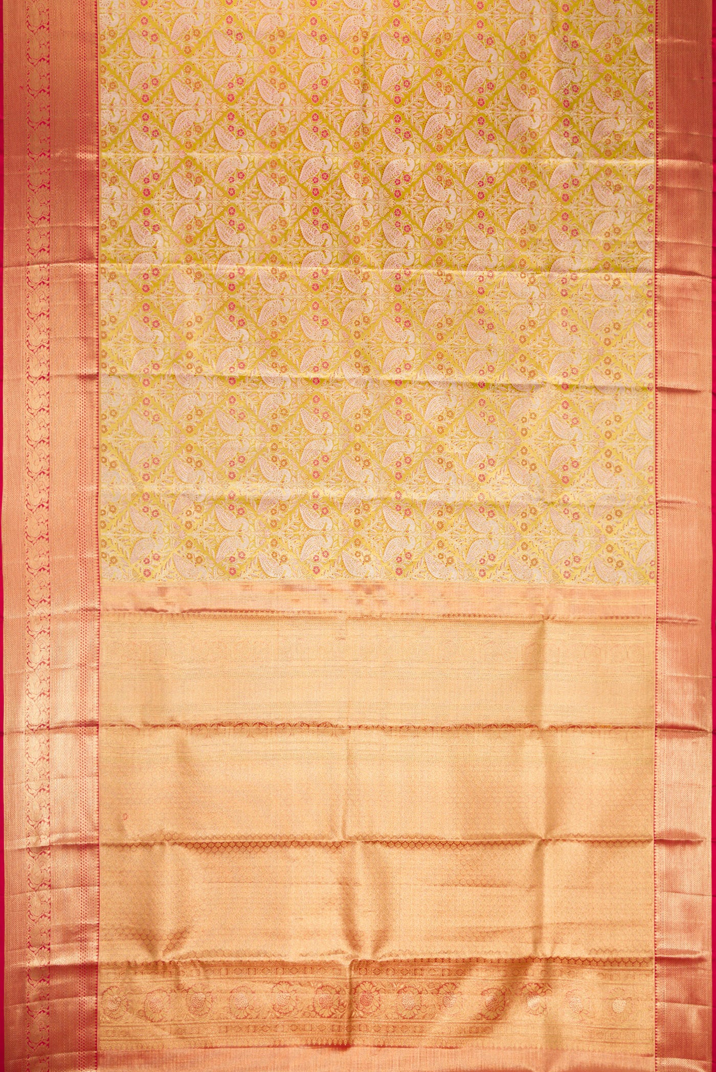 Flat view of Light Green Dual Tone Kanchipuram Tissue Silk Saree with Zari Brocade on the body and Zari Border. 