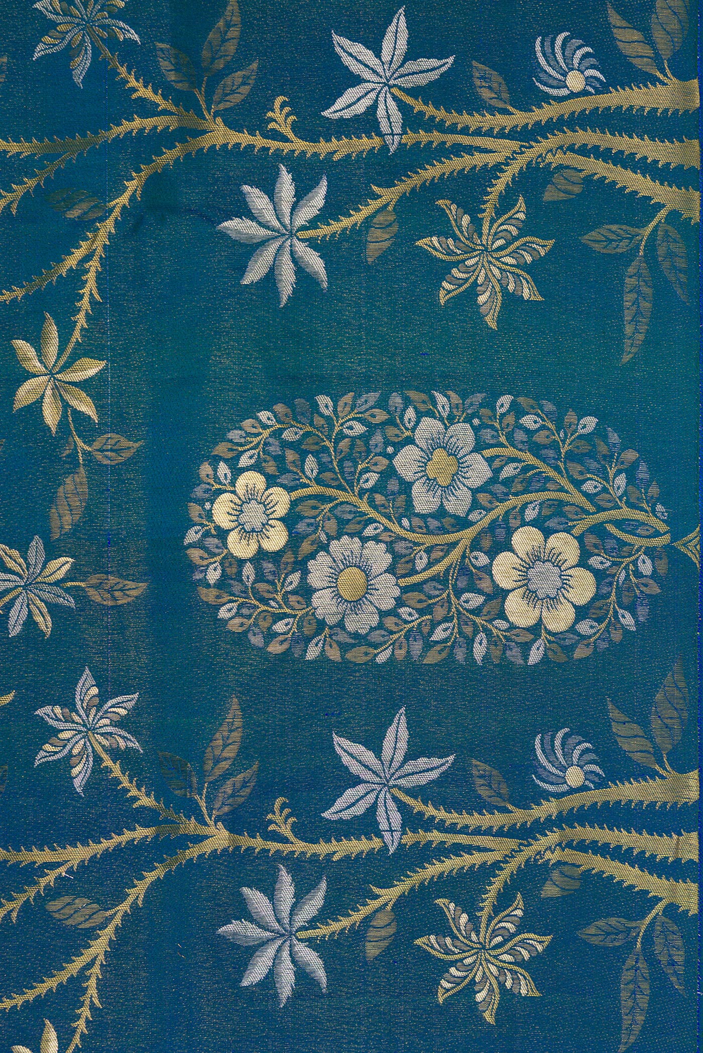 Border image of Peacock Blue Dual Tone Kanchipuram Silk Saree with Zari Brocade on the body and Fancy Border. 