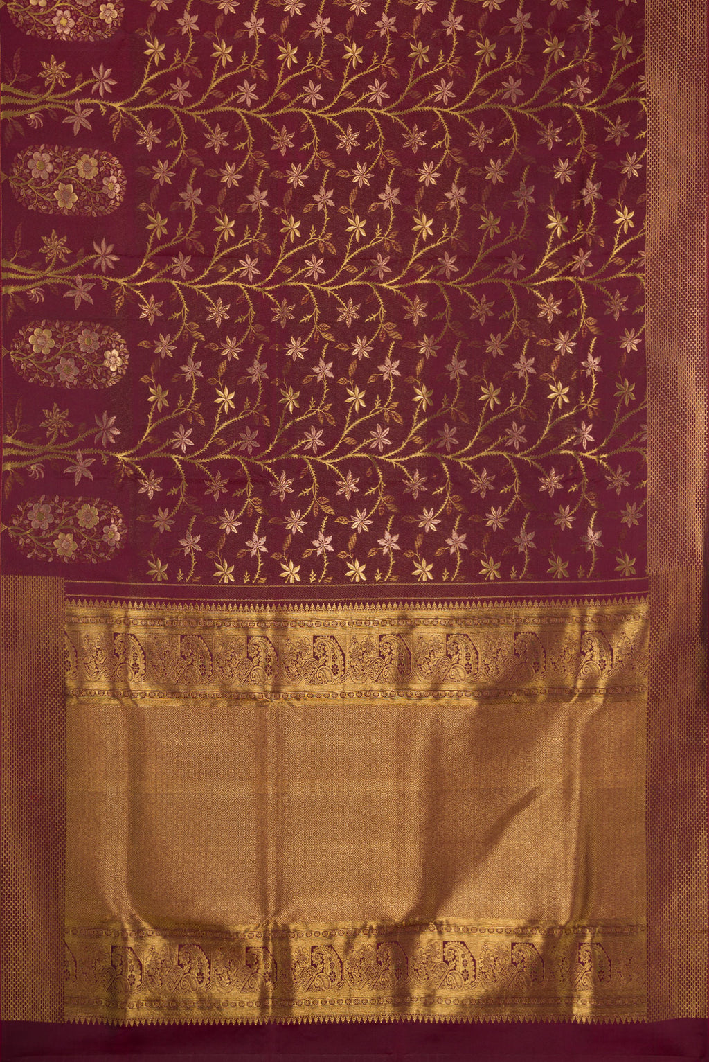 Flat view of Maroon Dual Tone Kanchipuram Silk Saree with Zari Brocade on the body and Fancy Border. 