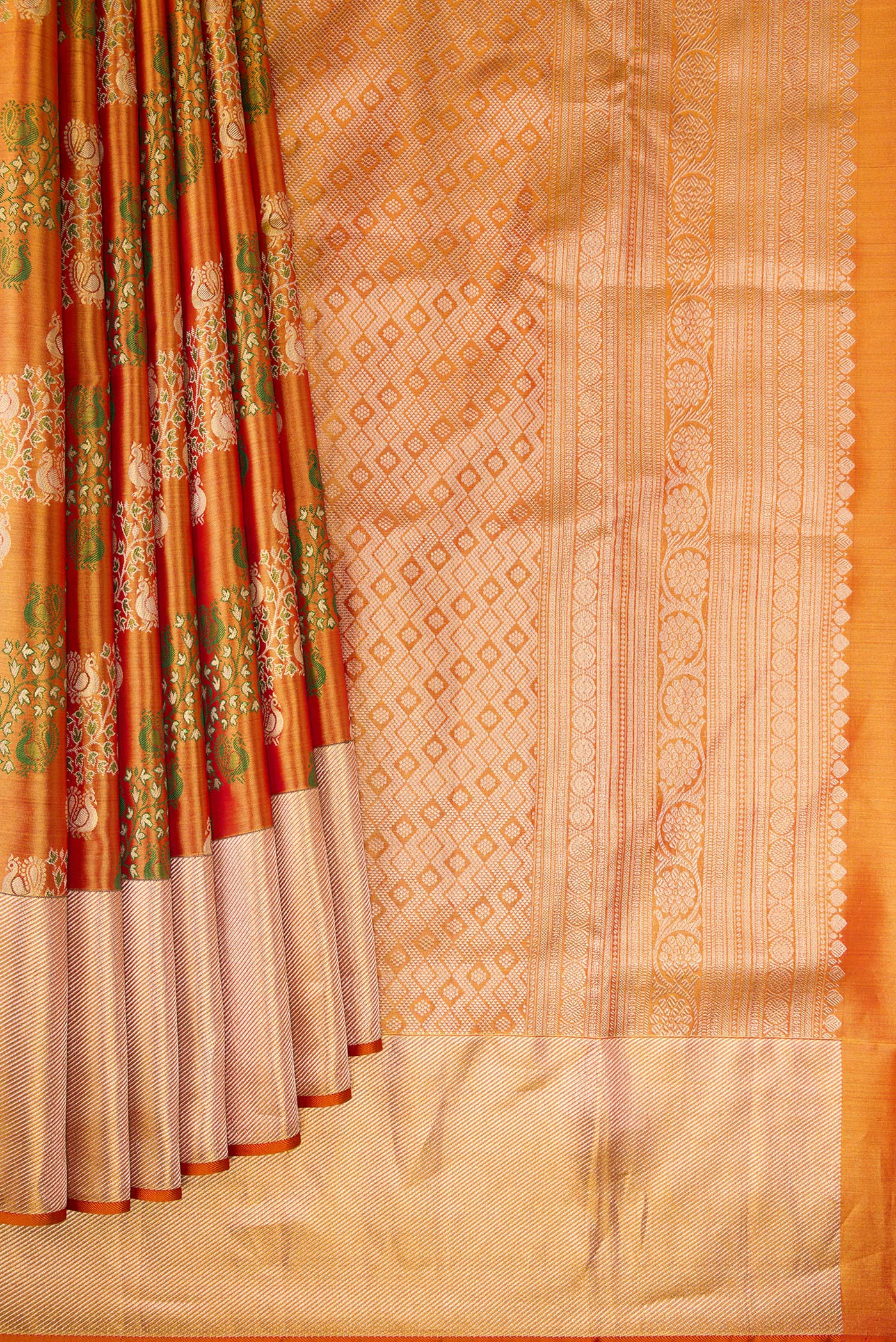 Pleats and pallu of Golden Peach Dual Tone Kanjivaram Tissue Silk Saree with Zari Brocade on the body and Zari Border. 