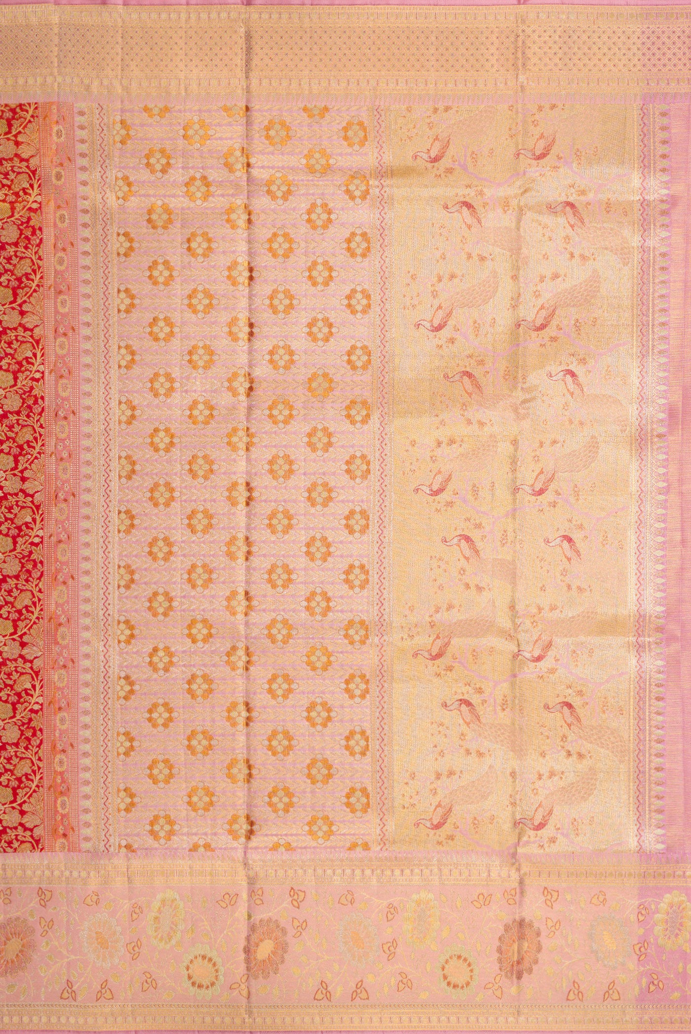Close up image of the pallu of Red Dual Tone Kanjivaram Tissue Silk Saree with Zari Brocade on the body and Zari Border. 