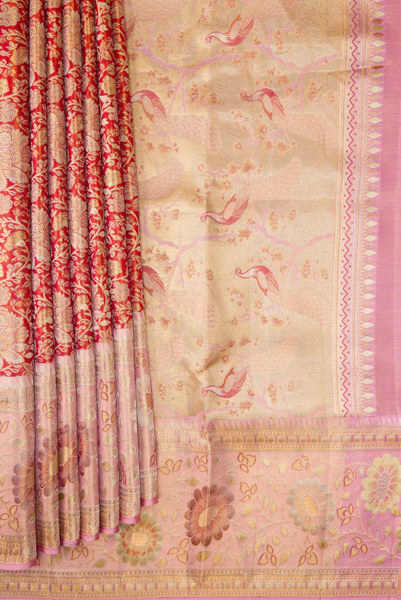 Pleats and pallu of Red Dual Tone Kanjivaram Tissue Silk Saree with Zari Brocade on the body and Zari Border. 