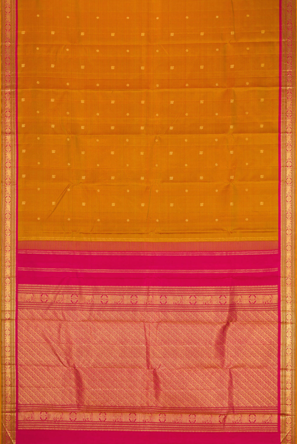 Flat view of Mustard Kanjivaram Silk Saree with Zari Butta on the body and Zari Border. 