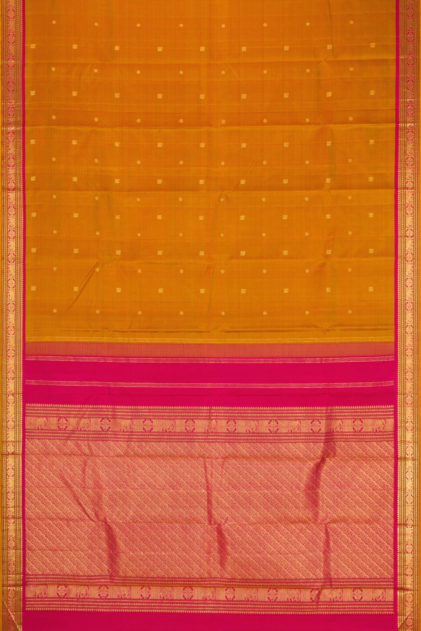 Flat view of Mustard Kanjivaram Silk Saree with Zari Butta on the body and Zari Border. 