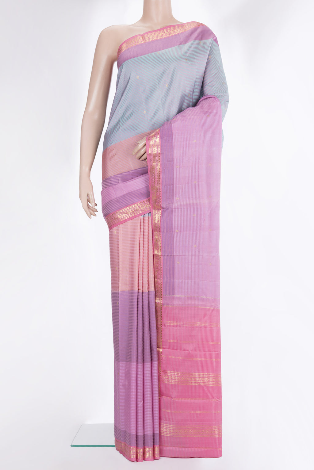 Pure Silk Lavender Dual Tone Kanchipuram Saree with Stripes on the body and Zari Border.  displayed on a mannequin