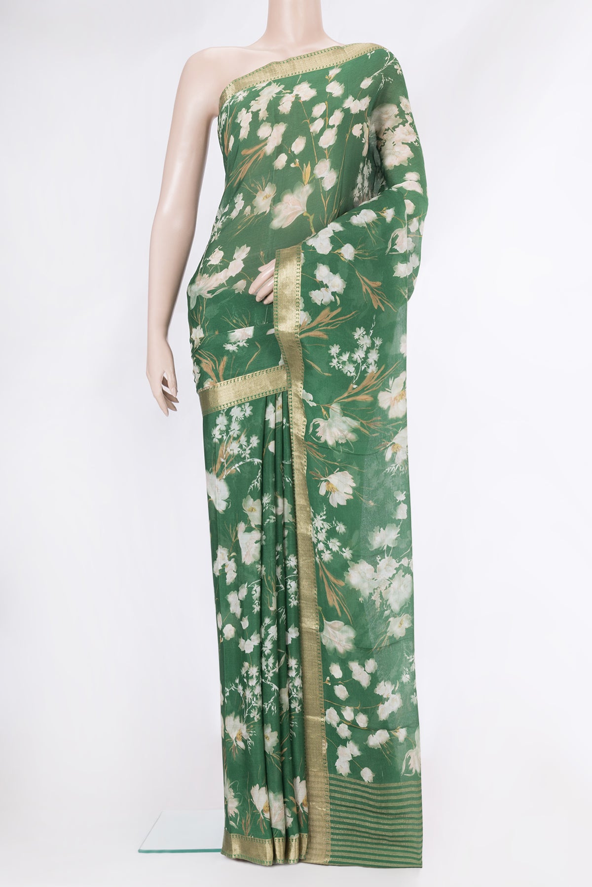 Green Dual Tone Mysore Chiffon Saree with Printed design on the body and Zari Border.  displayed on a mannequin