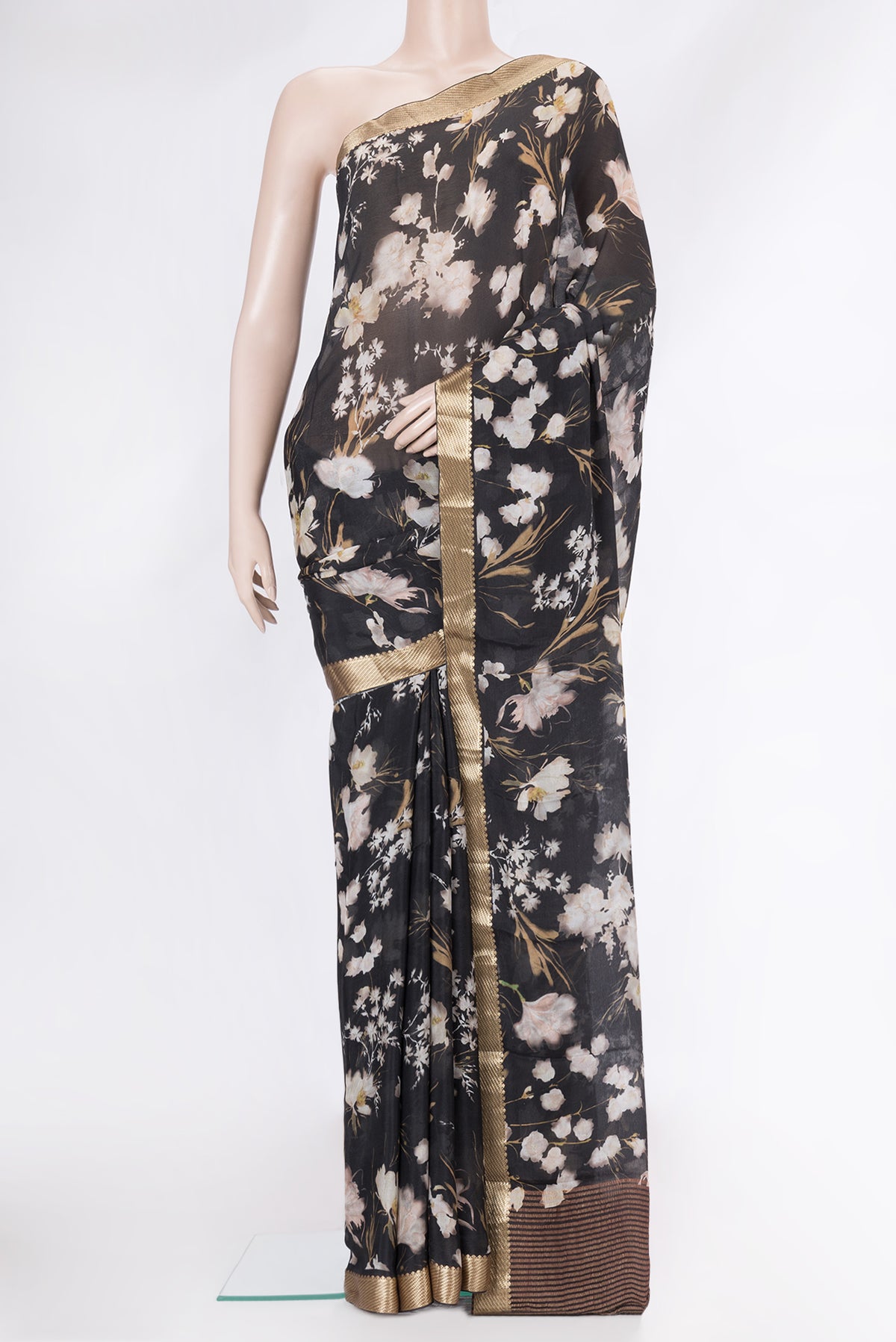 Black Mysore Chiffon Saree with Printed design on the body and Zari Border.  displayed on a mannequin
