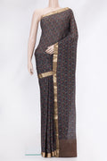 Black Mysore Chiffon Saree with Printed design on the body and Zari Border.  displayed on a mannequin