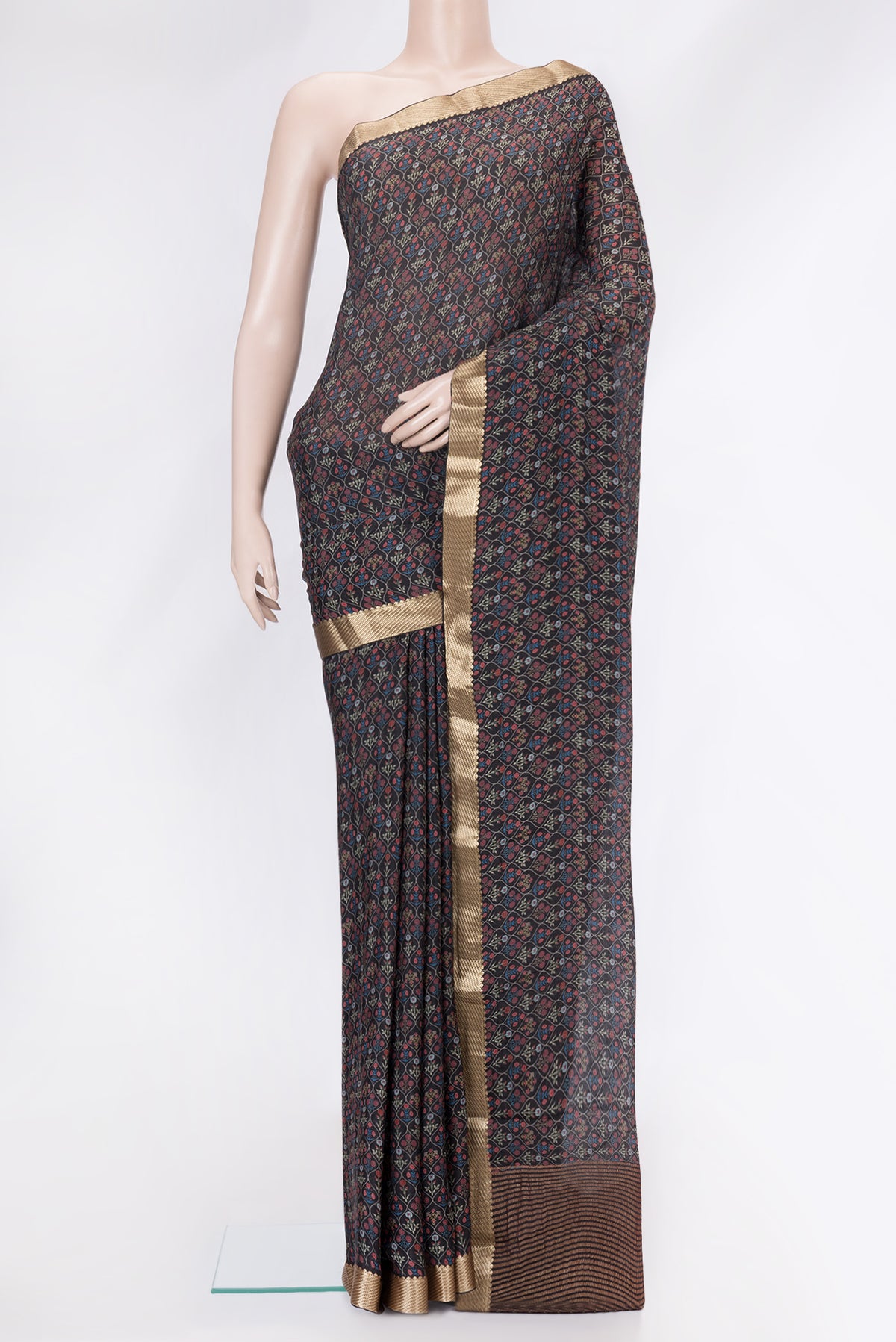 Black Mysore Chiffon Saree with Printed design on the body and Zari Border.  displayed on a mannequin