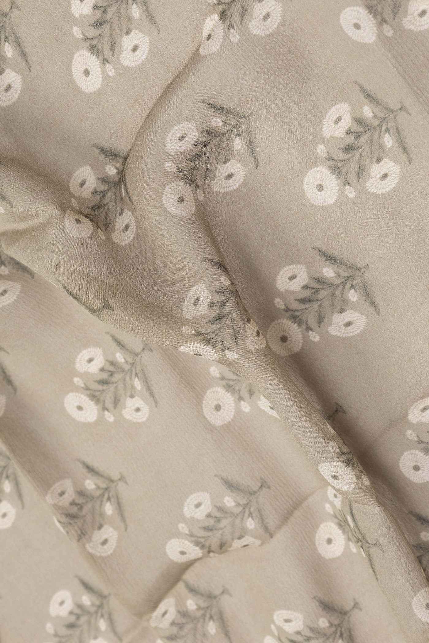Close up of Mehandi Green Dual Tone Mysore Chiffon Saree with Printed design on the body and Zari Border.  displaying folds
