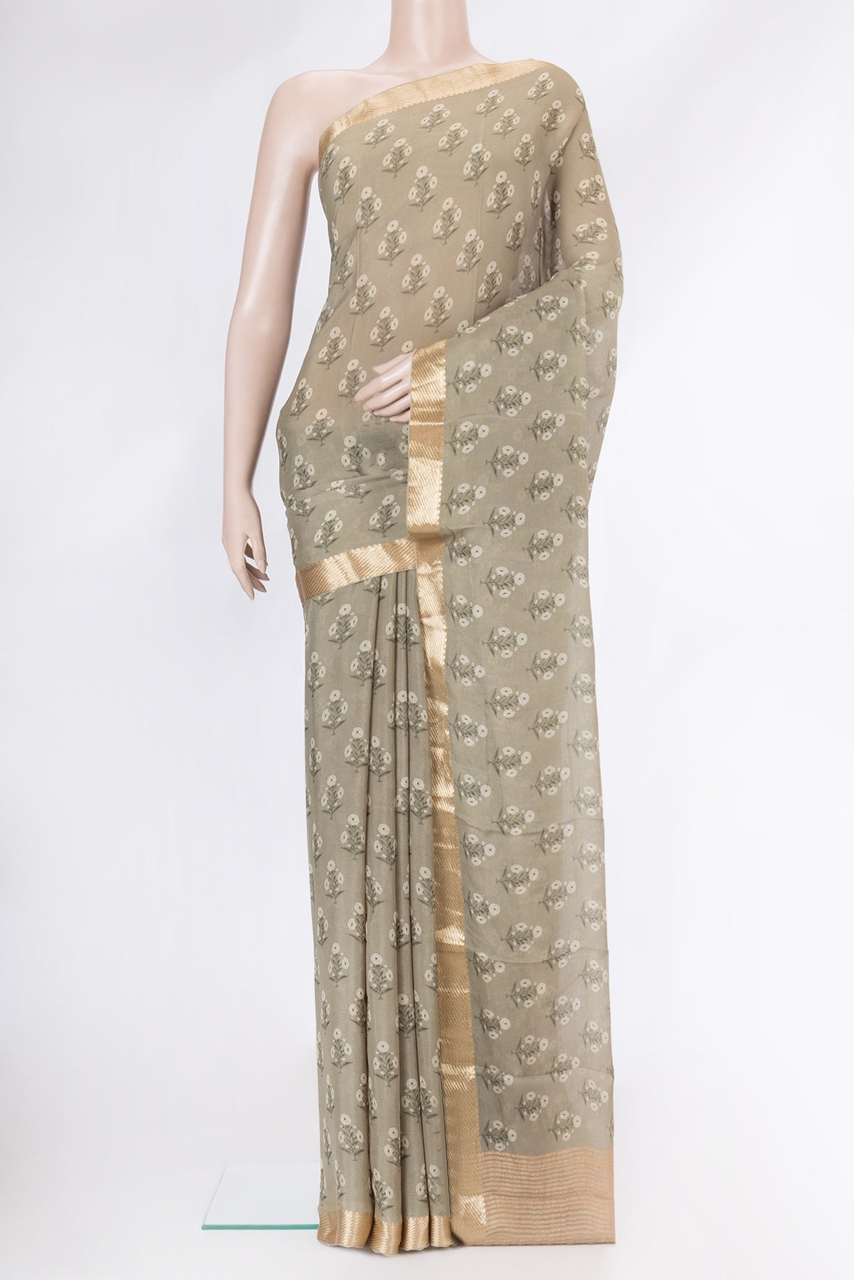Mehandi Green Dual Tone Mysore Chiffon Saree with Printed design on the body and Zari Border.  displayed on a mannequin