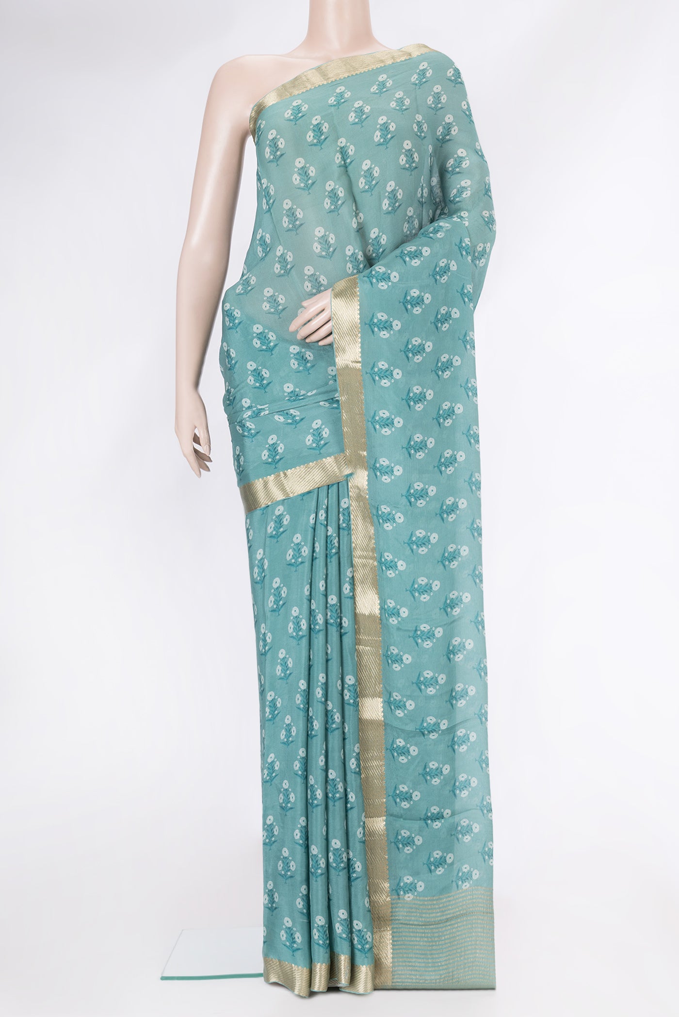 Maya Blue Dual Tone Mysore Chiffon Saree with Printed design on the body and Zari Border.  displayed on a mannequin