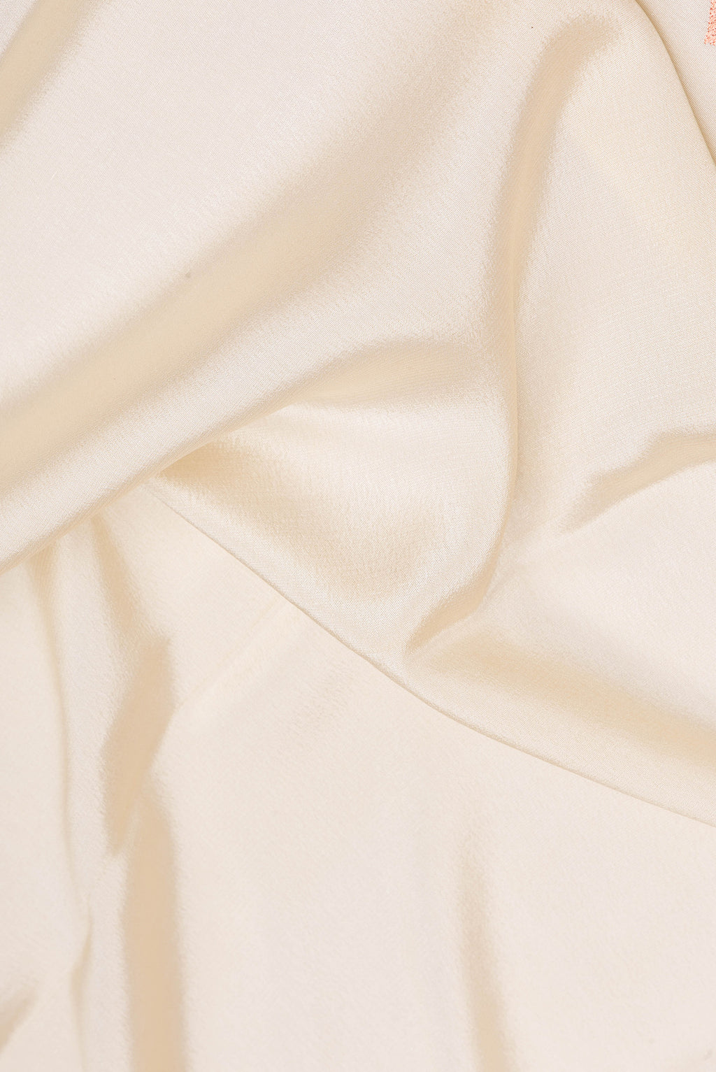 Close up of Beige Mysore Silk Saree with Plain Body and Embroidery Border.  displaying folds