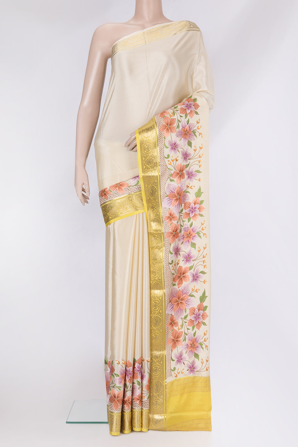 Beige Mysore Silk Saree with Plain Body and Embroidery Border.  displayed on a mannequin