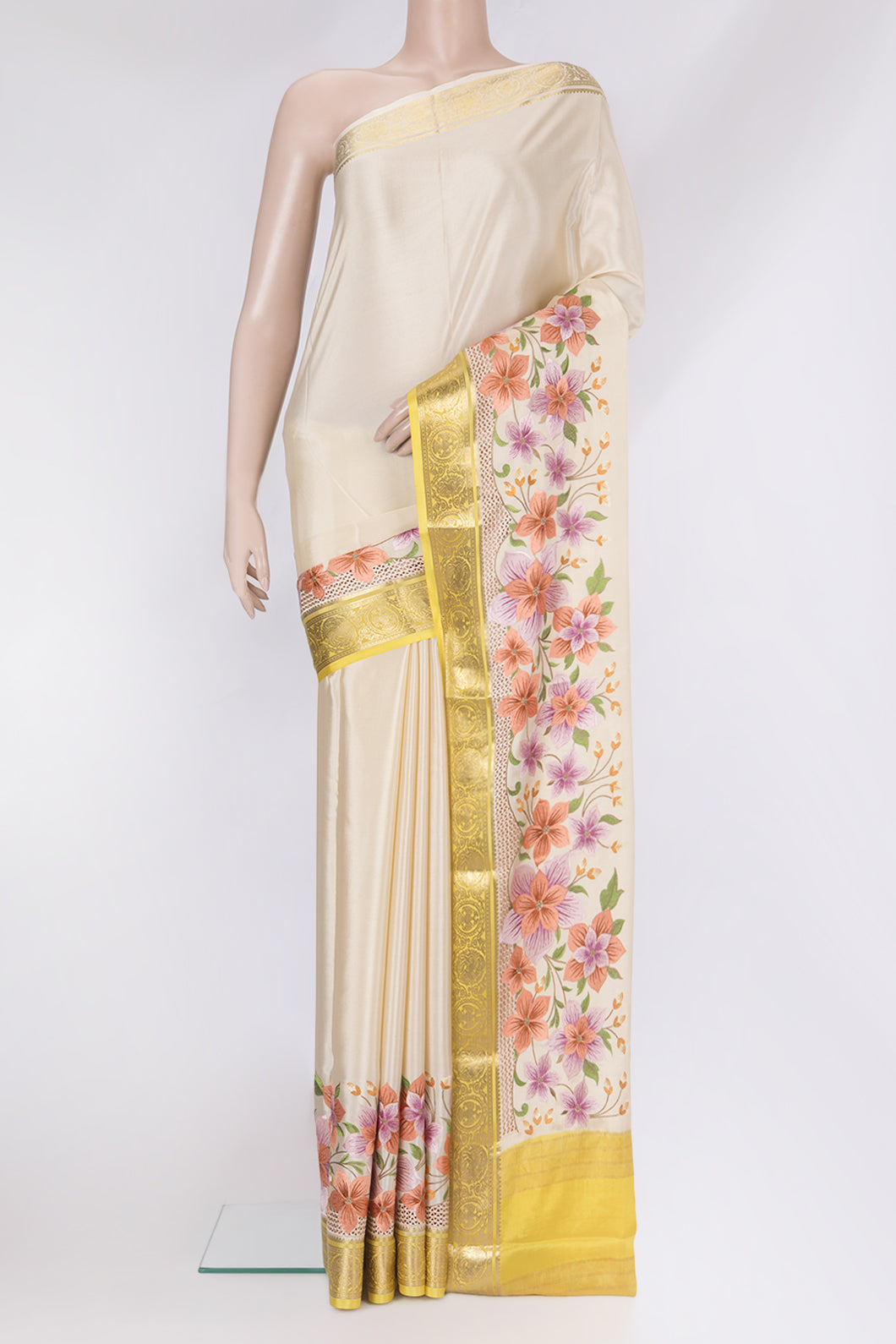 Beige Mysore Silk Saree with Plain Body and Embroidery Border.  displayed on a mannequin