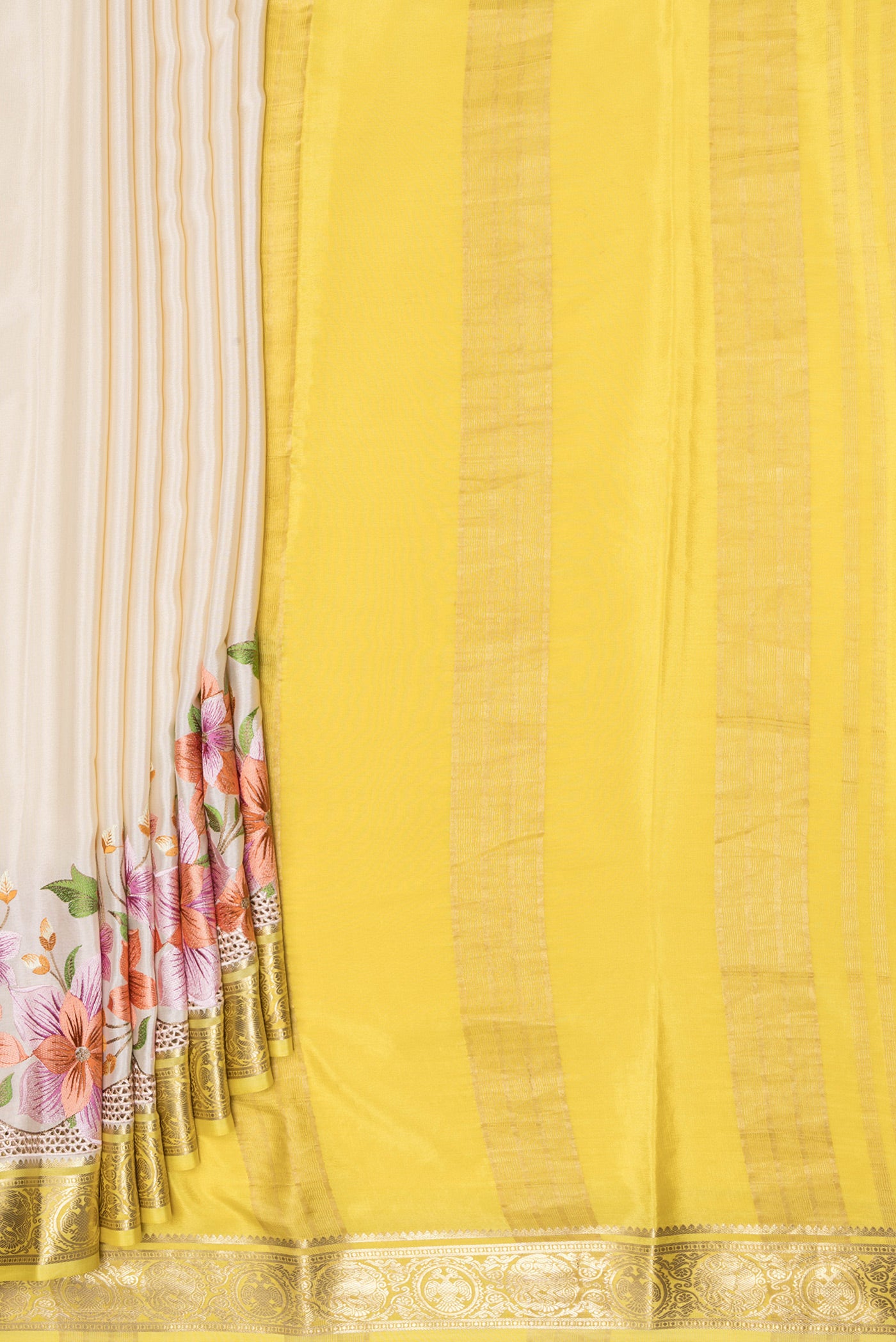 Pleats and pallu of Beige Mysore Silk Saree with Plain Body and Embroidery Border. 