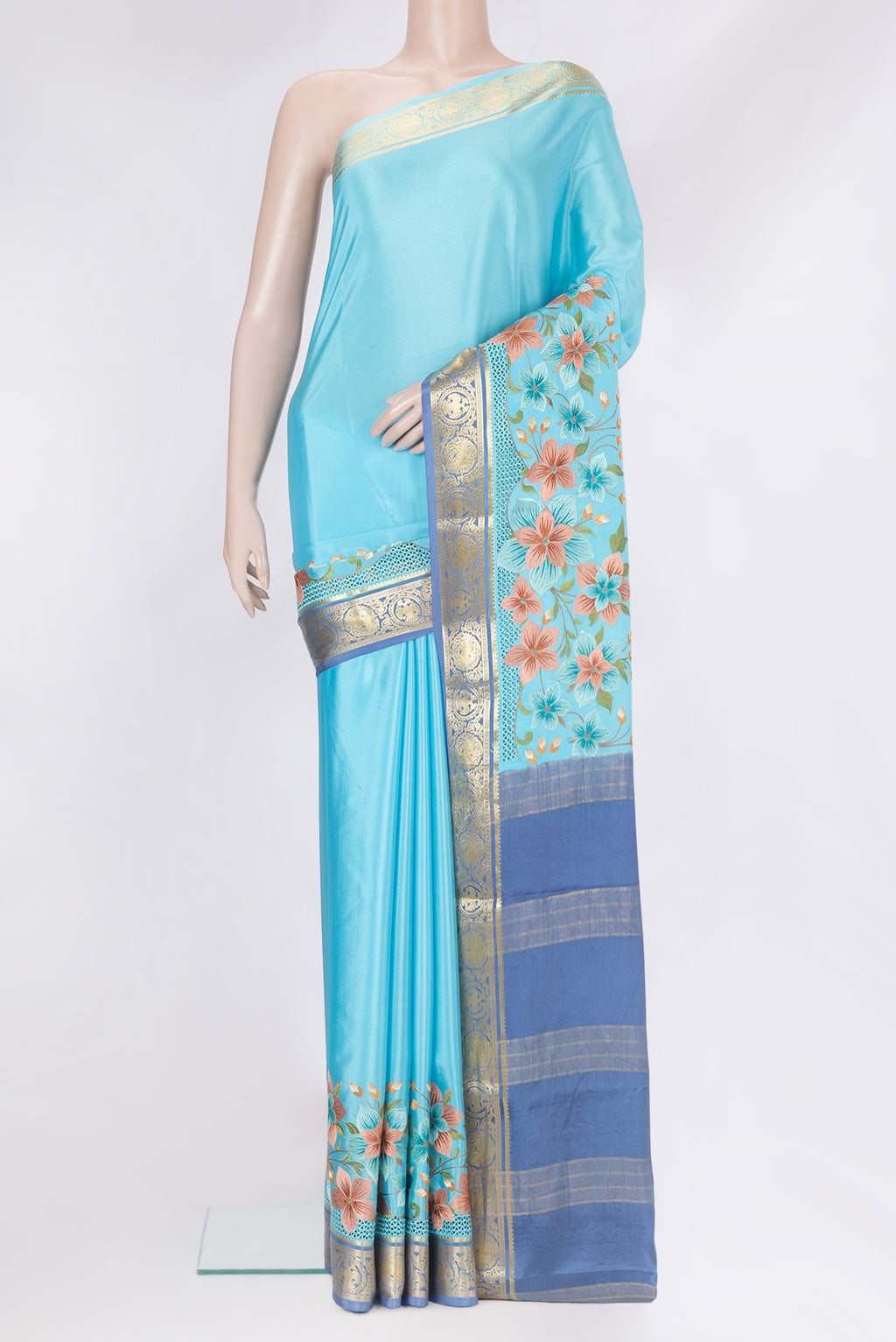 Sky Blue Mysore Silk Saree with Plain Body and Embroidery Border.  displayed on a mannequin