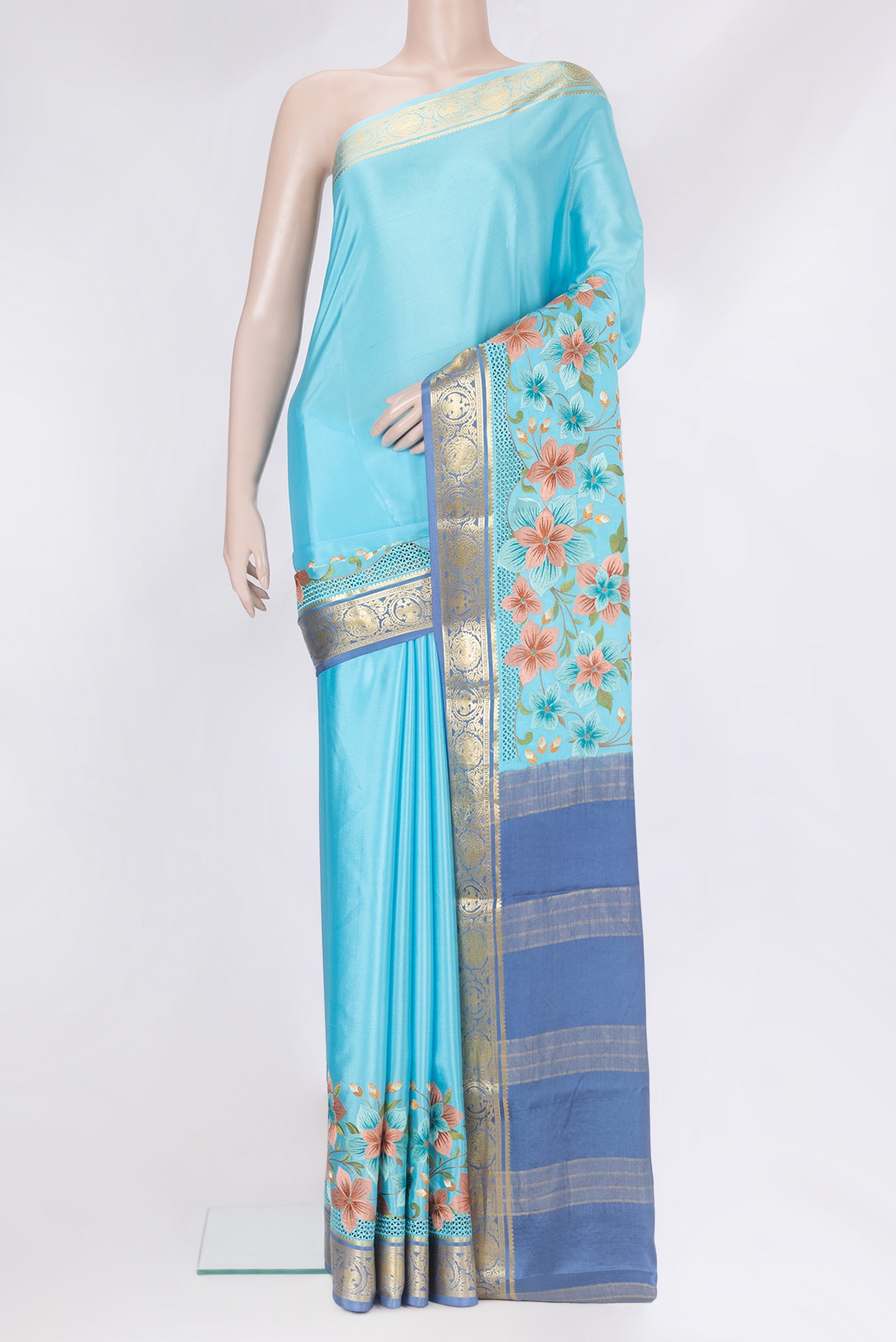 Sky Blue Mysore Silk Saree with Plain Body and Embroidery Border.  displayed on a mannequin