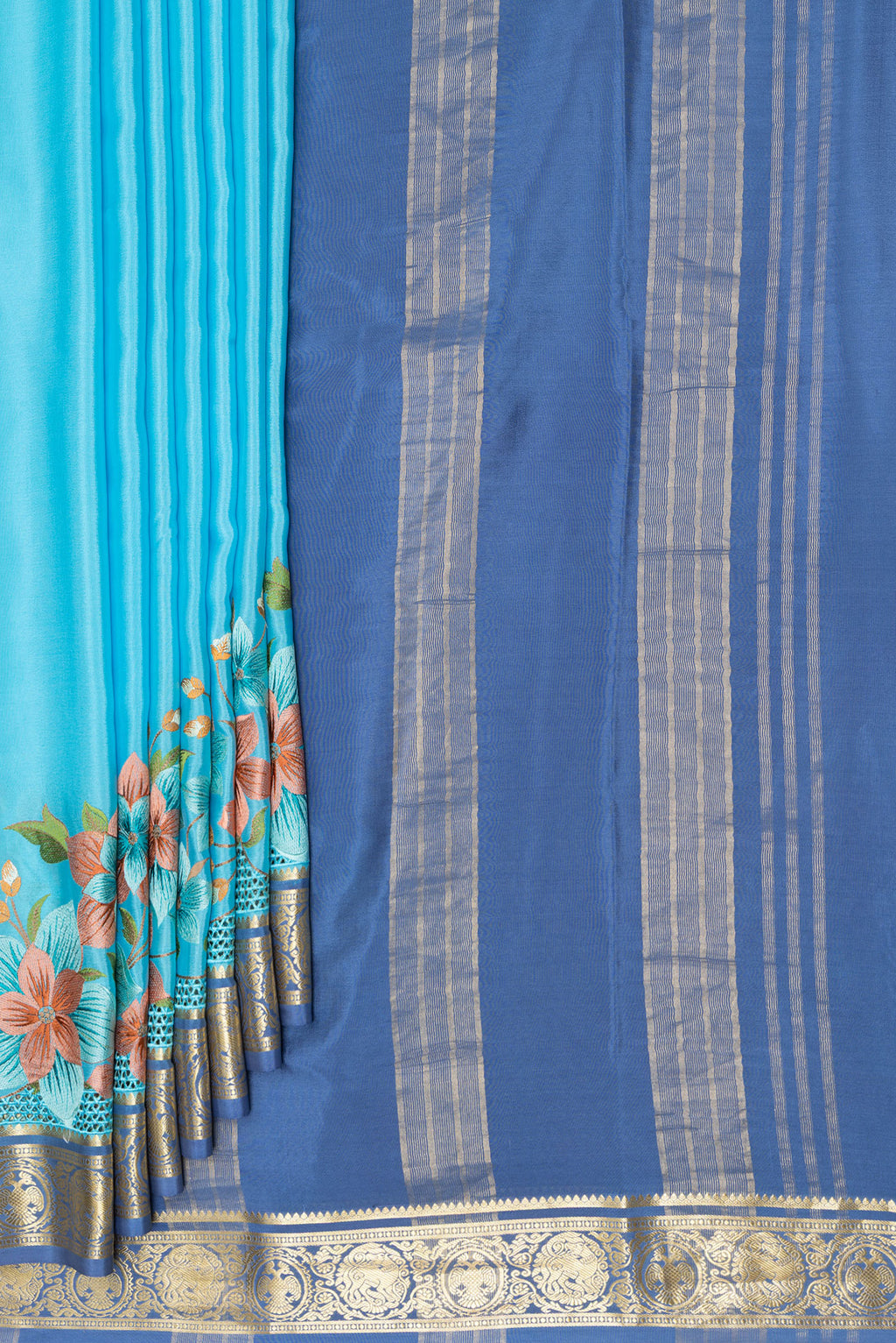 Pleats and pallu of Sky Blue Mysore Silk Saree with Plain Body and Embroidery Border. 