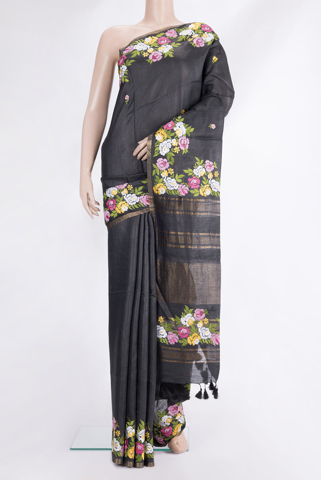 Black Tussar Saree with Embroidered on the body and Embroidered Border.  displayed on a mannequin