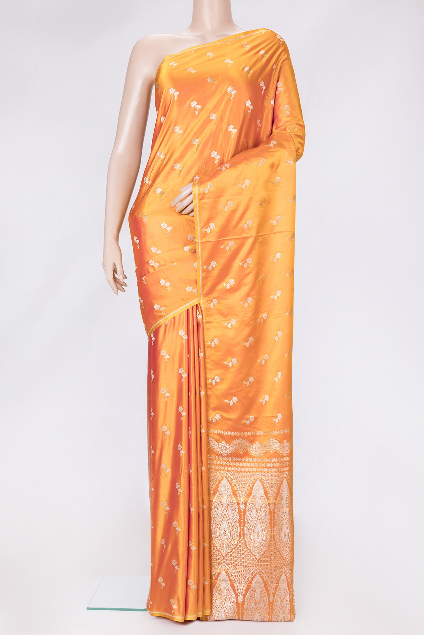 Orange Dual Tone Blended Banarasi Silk Saree with Zari Butta on the body and Zari Border.  displayed on a mannequin