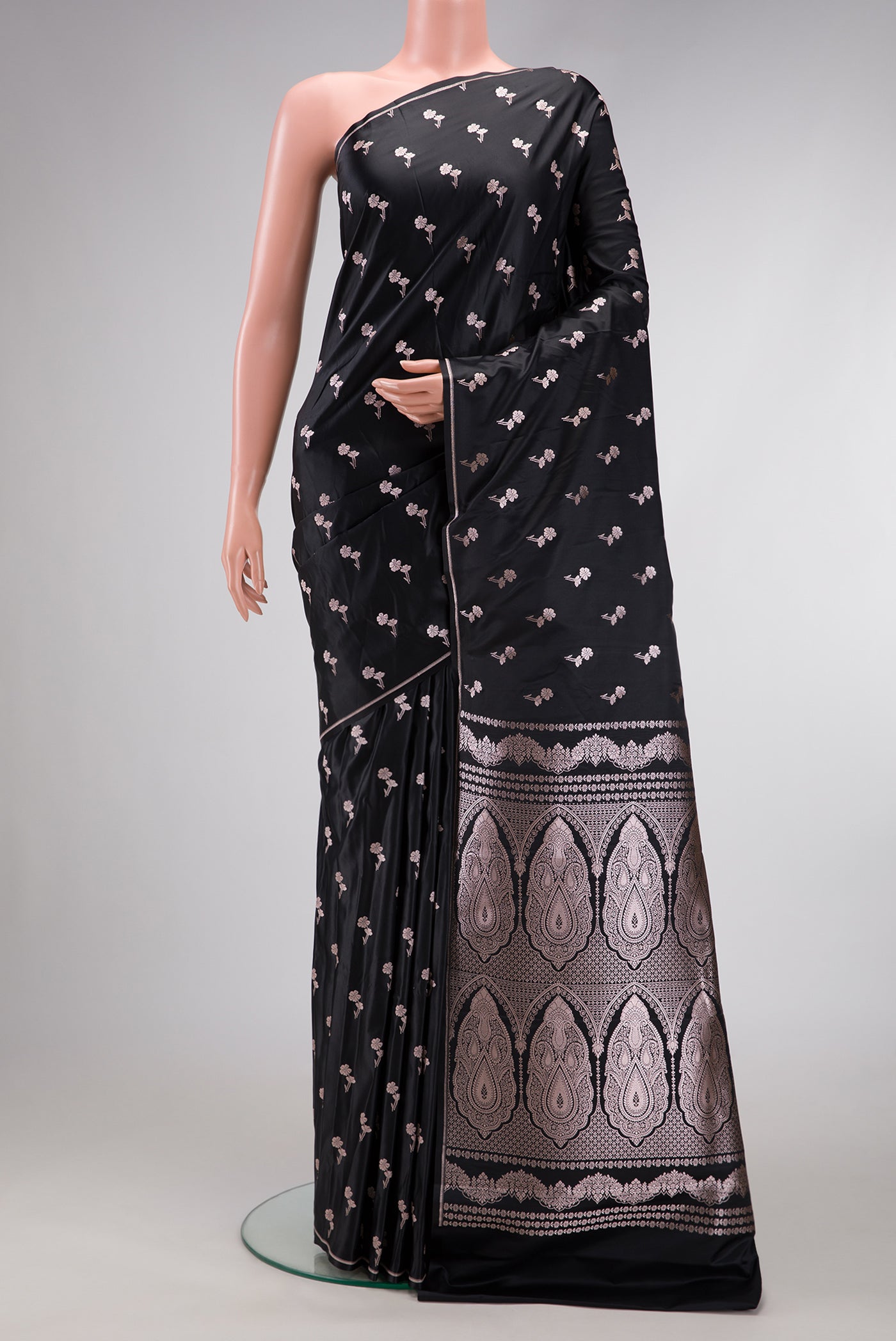 Black Dual Tone Blended Banarasi Silk Saree with Zari Butta on the body and Thin Zari Line.  displayed on a mannequin