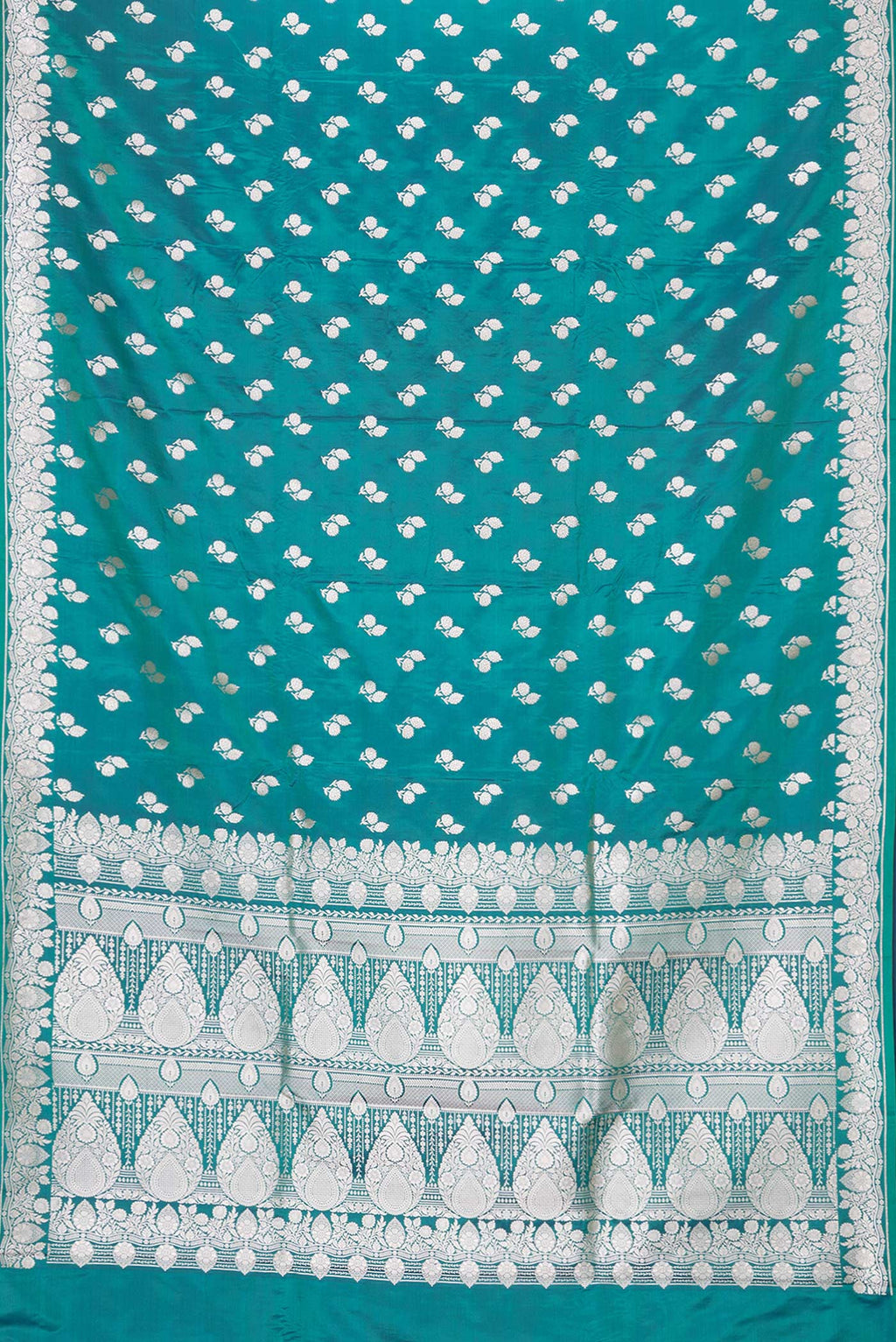 Flat view of Peacock Blue Dual Tone Blended Banarasi Silk Saree with Zari Butta on the body and Zari Border. 