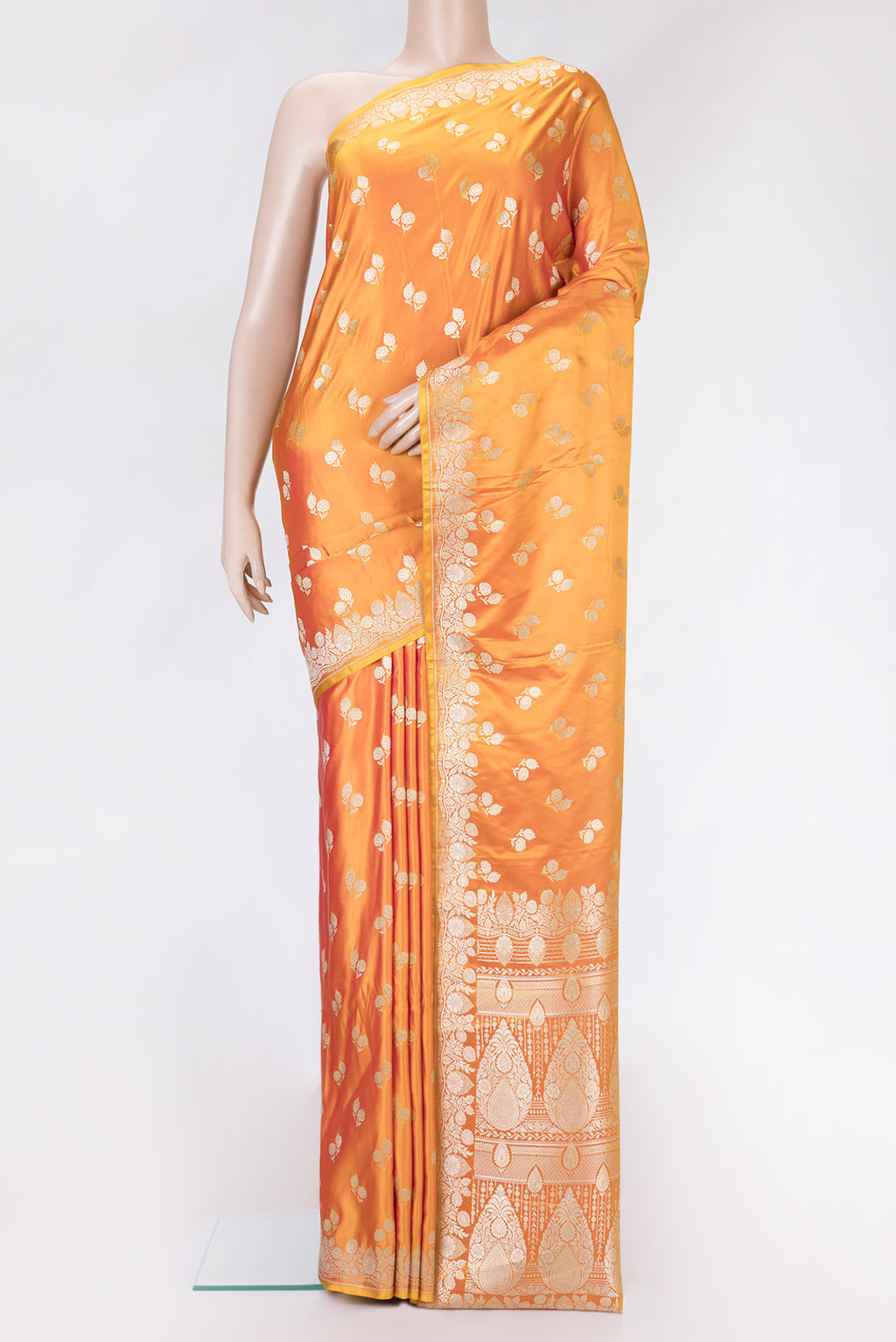 Orange Dual Tone Blended Banarasi Silk Saree with Zari Butta on the body and Zari Border.  displayed on a mannequin