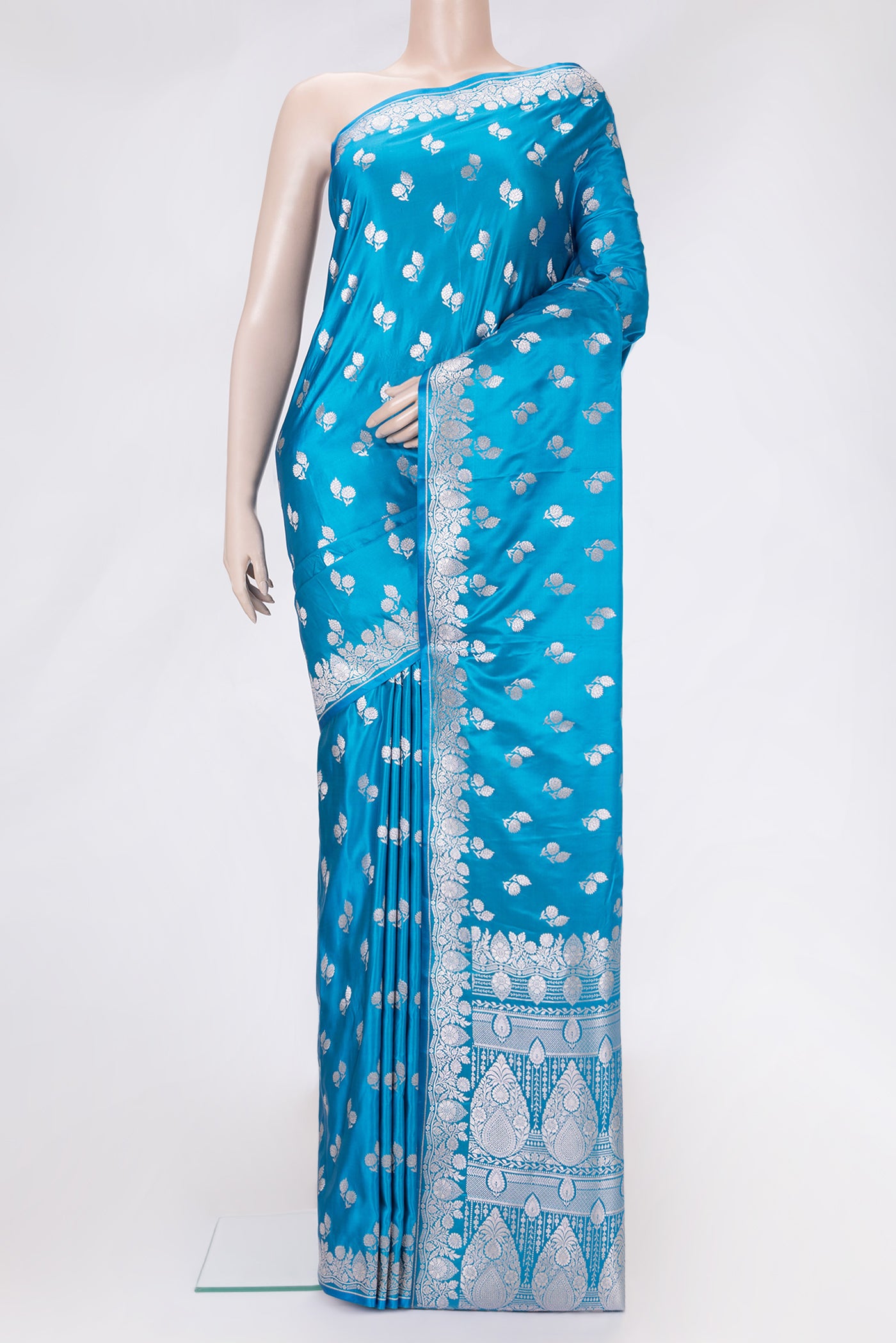 Sky Blue Dual Tone Blended Banarasi Silk Saree with Zari Butta on the body and Zari Border.  displayed on a mannequin