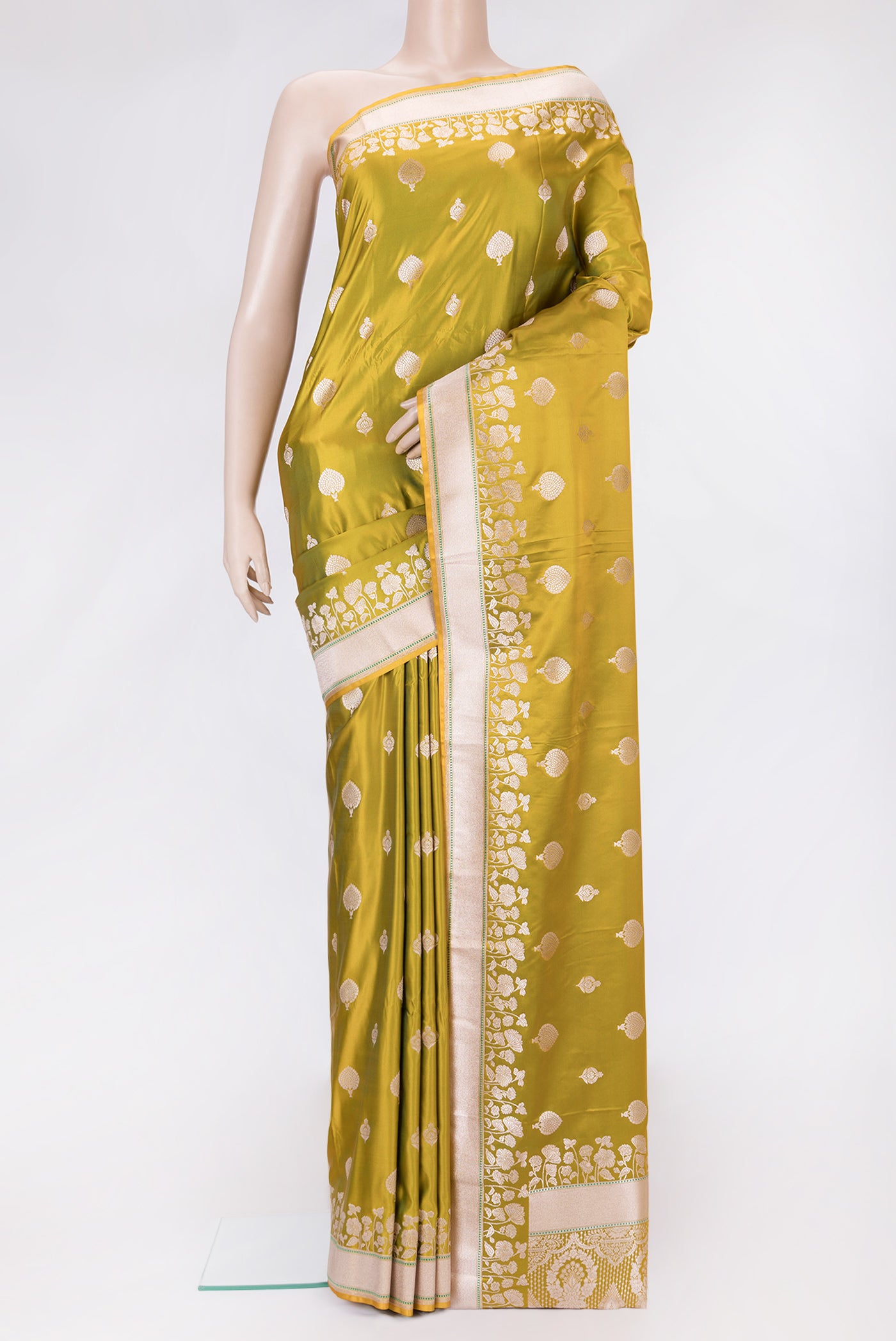 Parrot Green Dual Tone Blended Banarasi Silk Saree with Zari Butta on the body and Zari Border.  displayed on a mannequin