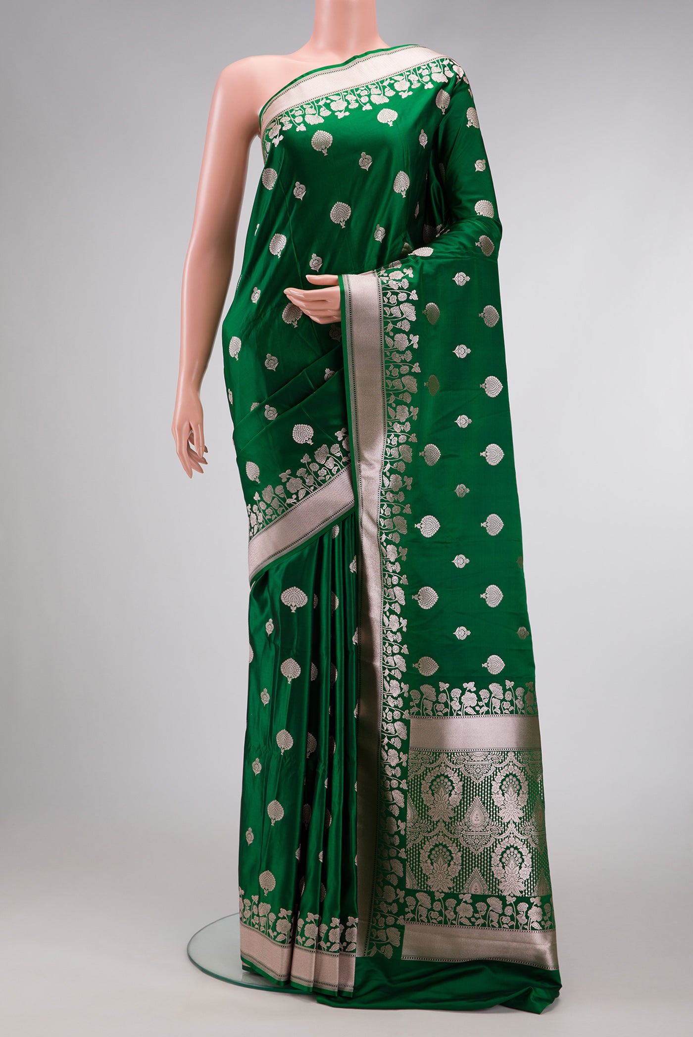 Green Dual Tone Blended Banarasi Silk Saree with Zari Butta on the body and Zari Border.  displayed on a mannequin