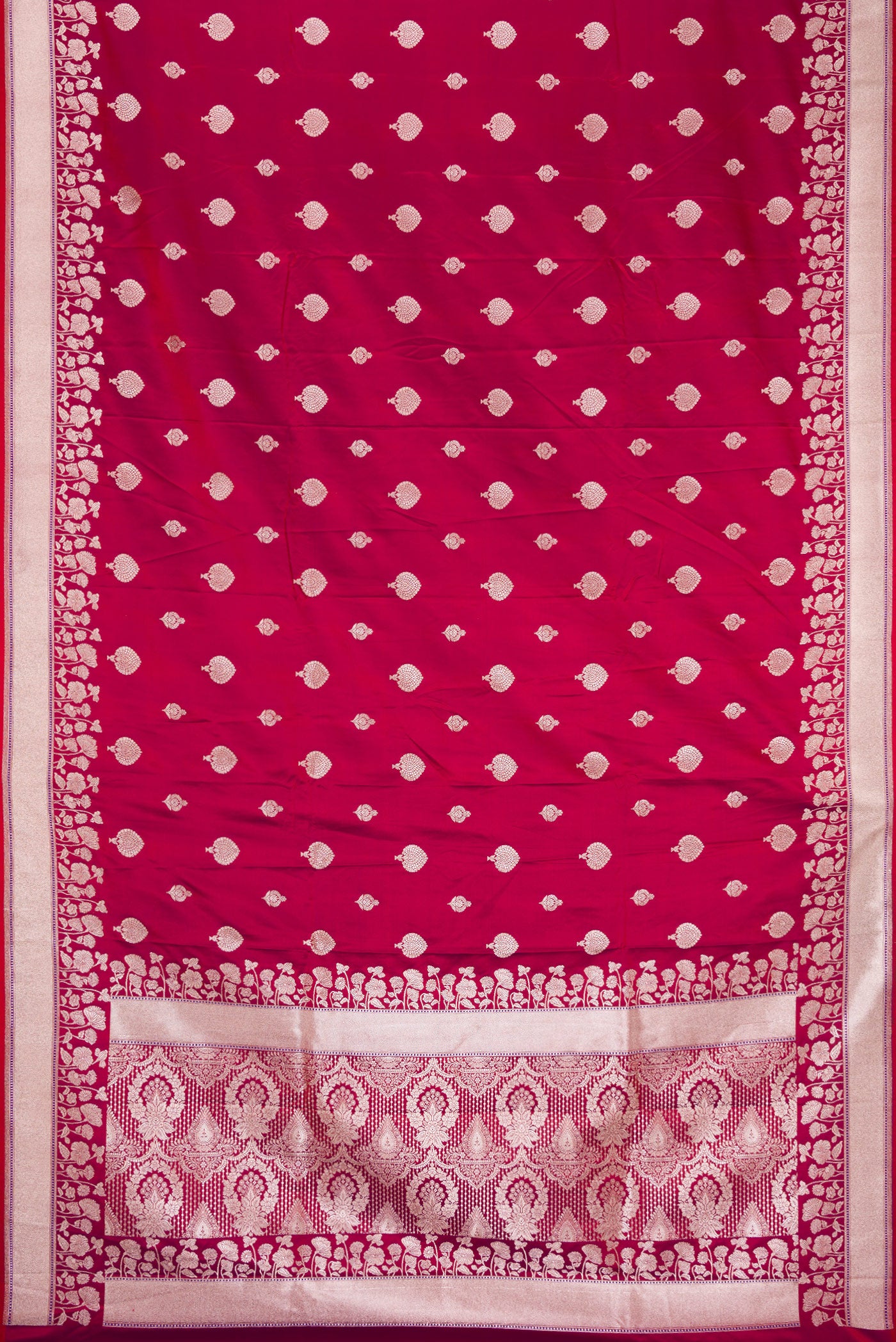 Flat view of Maroon Dual Tone Blended Banarasi Silk Saree with Zari Butta on the body and Zari Border. 