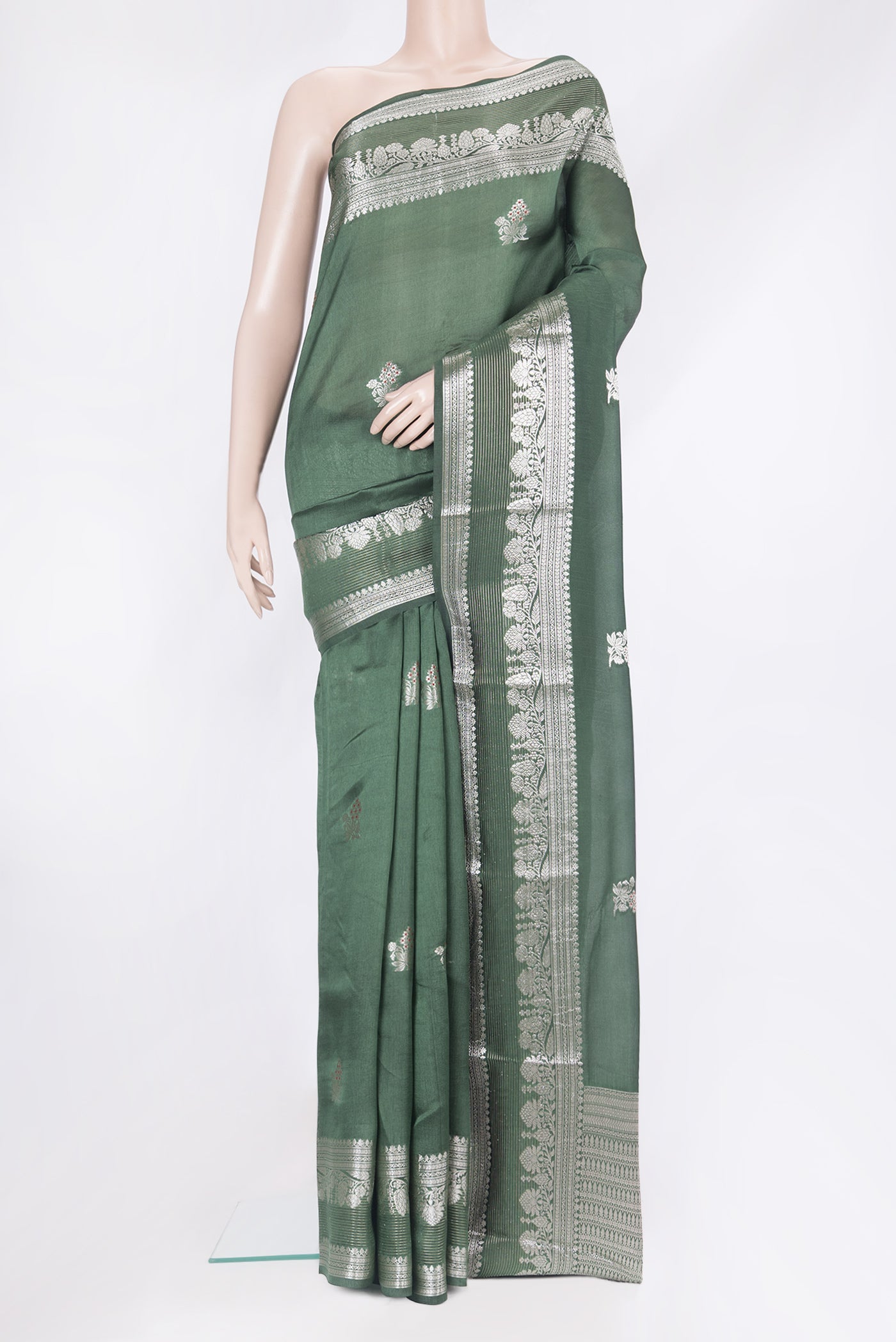 Bottle Green Dual Tone Blended Tussar Silk Saree with Zari Butta on the body and Zari Border.  displayed on a mannequin
