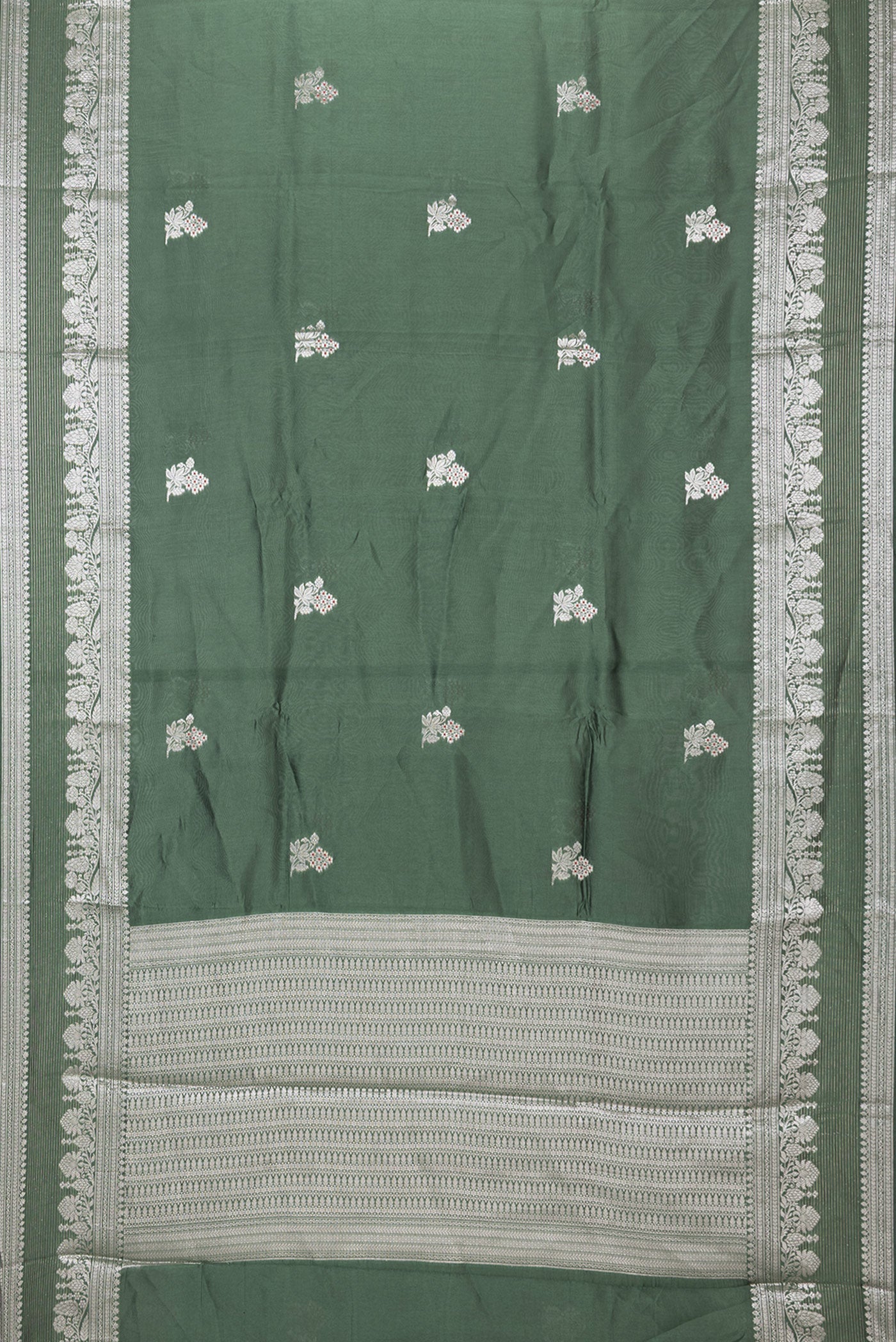 Flat view of Bottle Green Dual Tone Blended Tussar Silk Saree with Zari Butta on the body and Zari Border. 