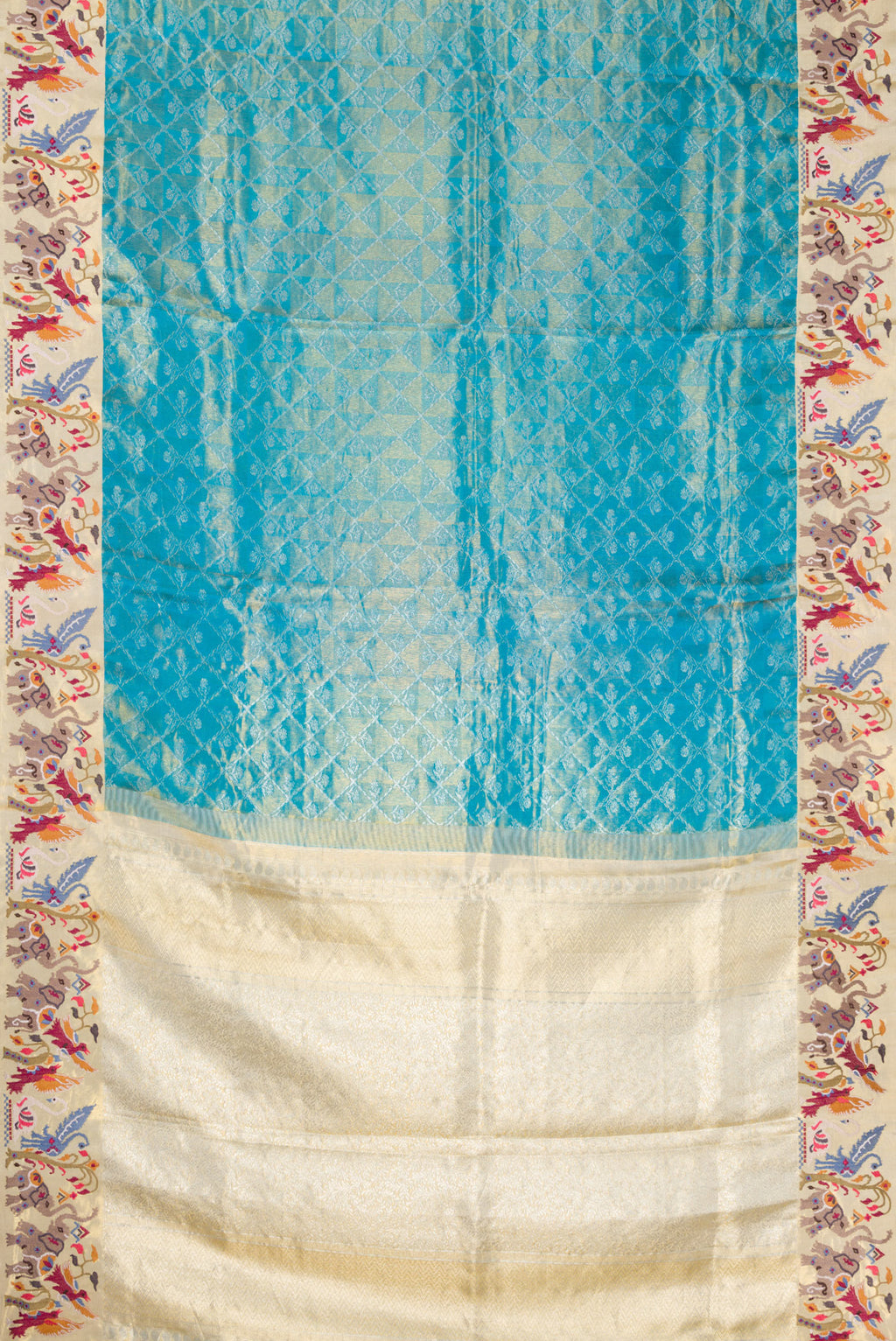 Flat view of Pure Silk Pure Zari Sky Blue Dual Tone Banarasi Saree with Zari Brocade on the body and Embroidery Border. 