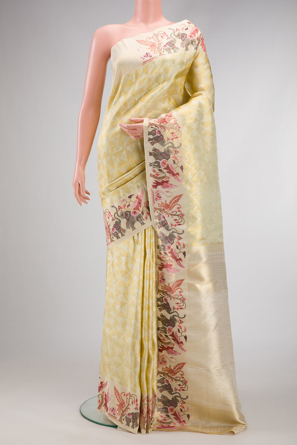 Green, Maroon & Burgundy Dual Tone Banarasi Silk Saree with Zari Brocade on the body and Embroidery Border.  displayed on a mannequin