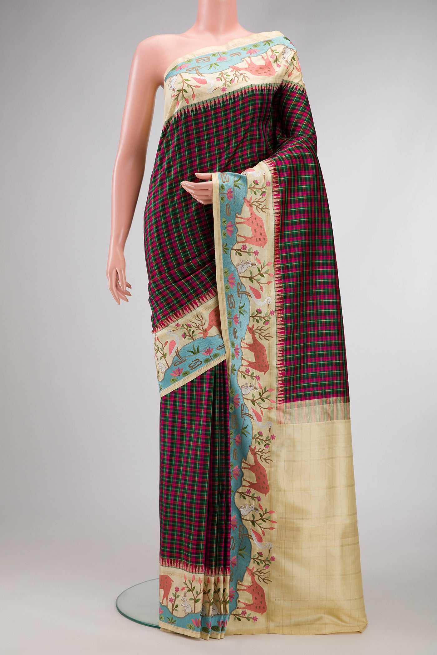 Pure Silk Pure Zari Green, Pink and Black Color Banarasi Saree with Checked design on the body and Embroidery Border.  displayed on a mannequin